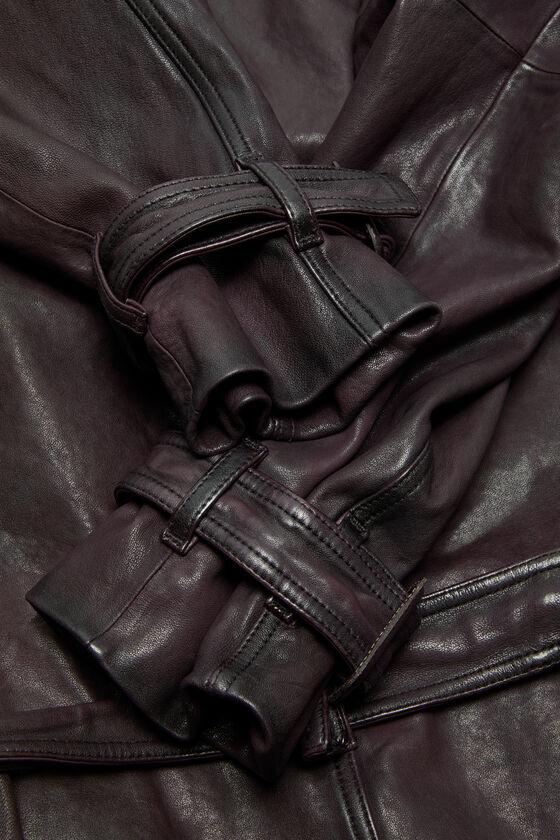 Belted leather jacket Product Image