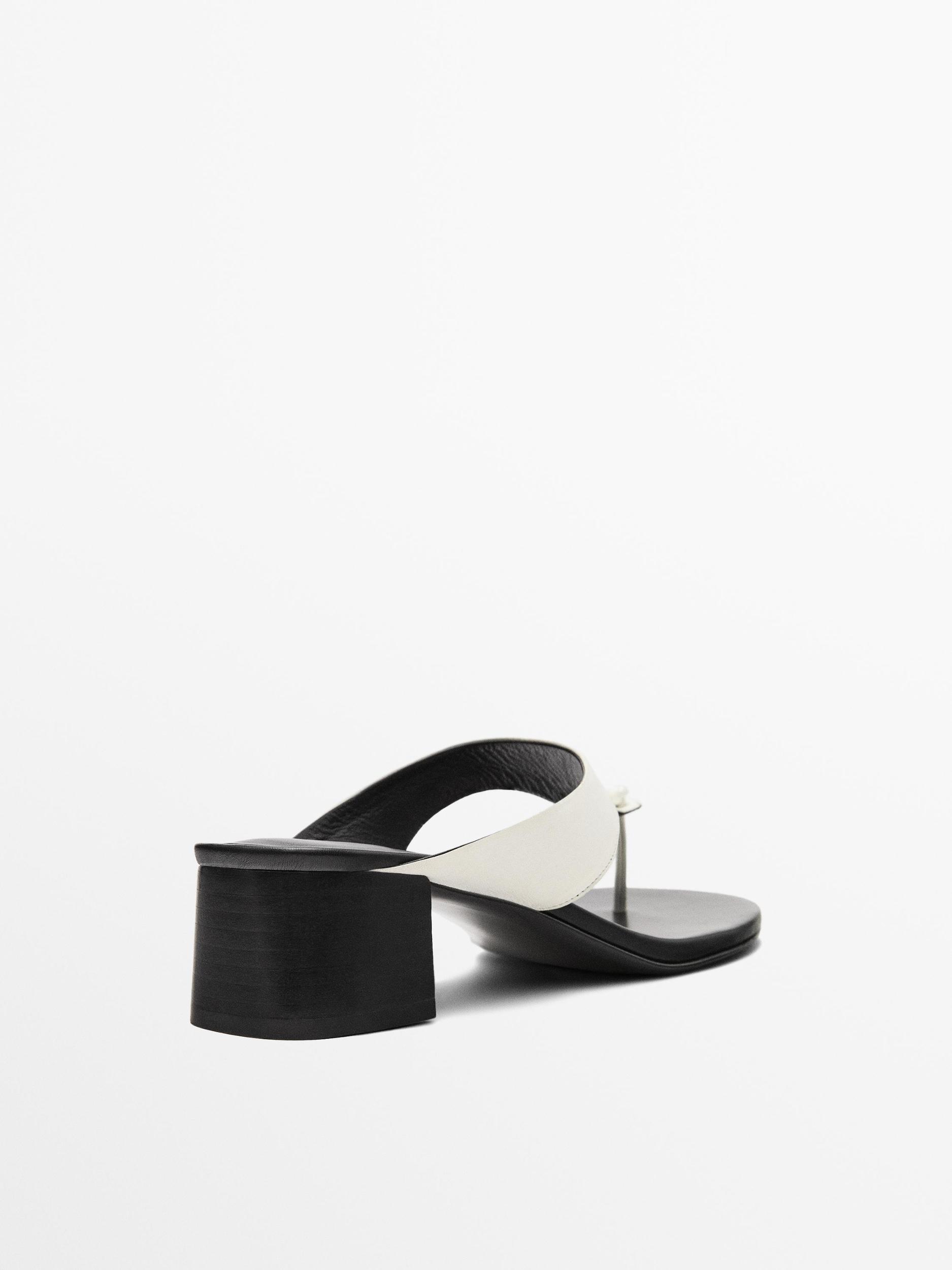 Heeled sandals with toe divider Product Image