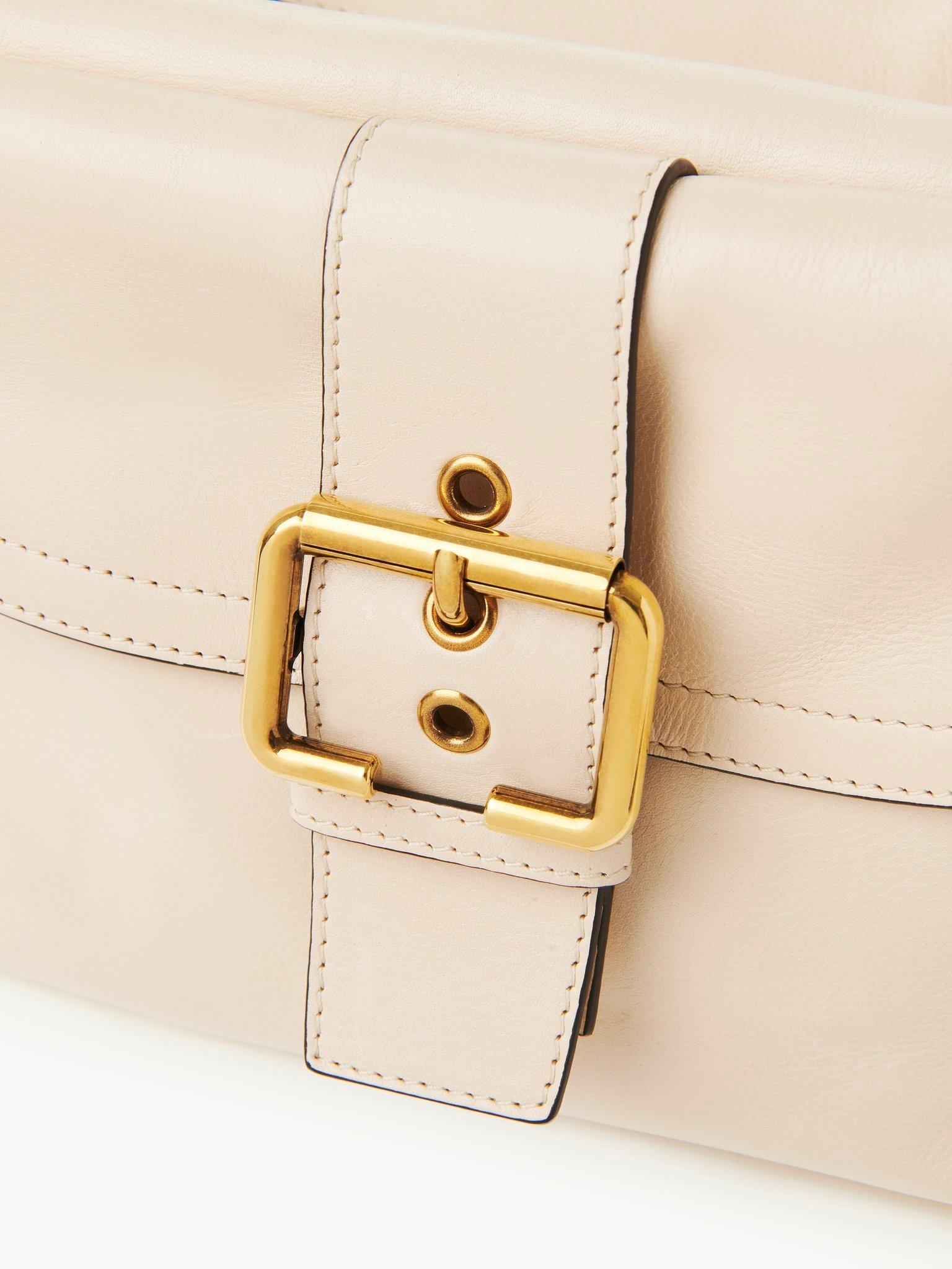 Camera bag in shiny leather Product Image