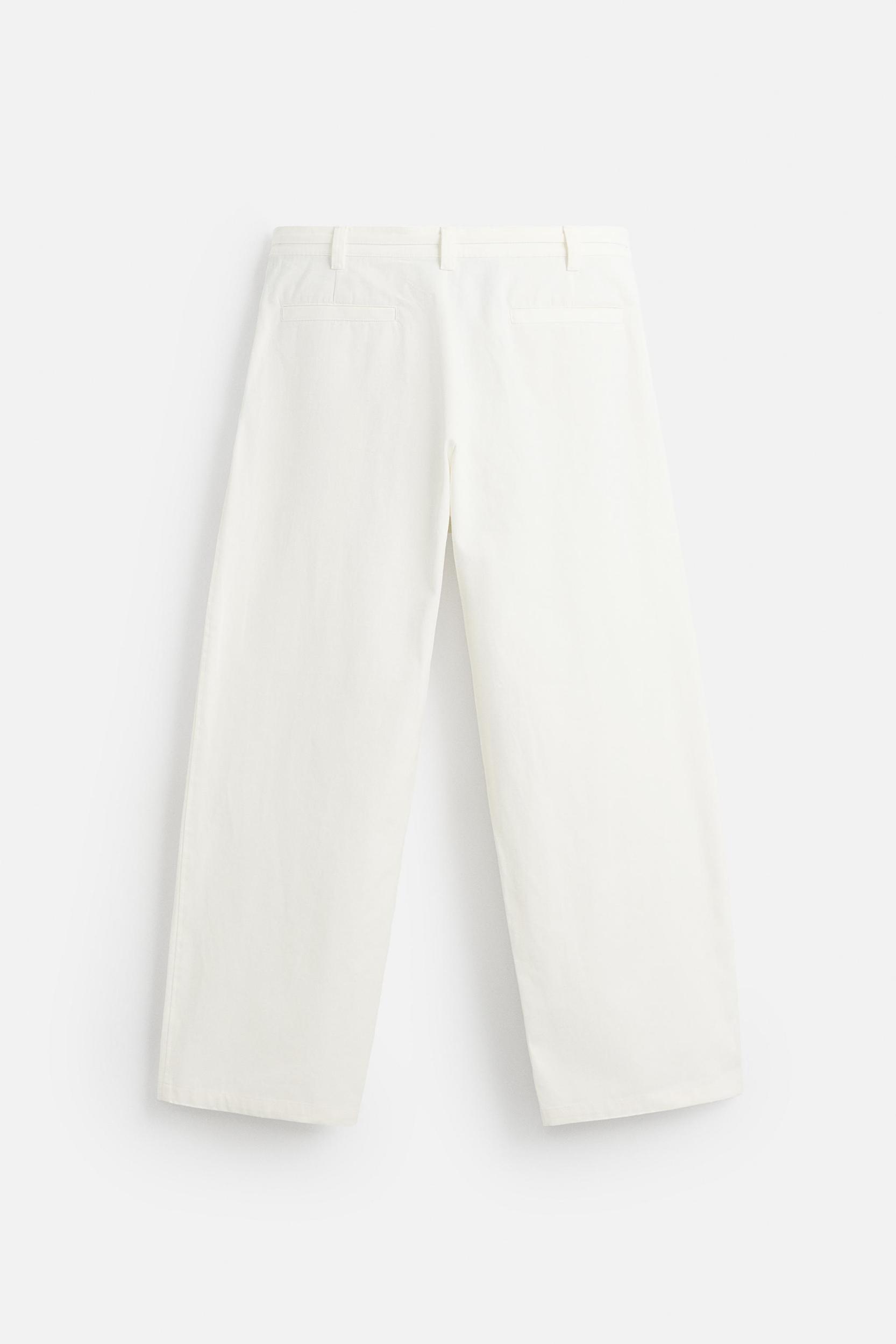 RELAXED FIT PLEATED PANTS Product Image