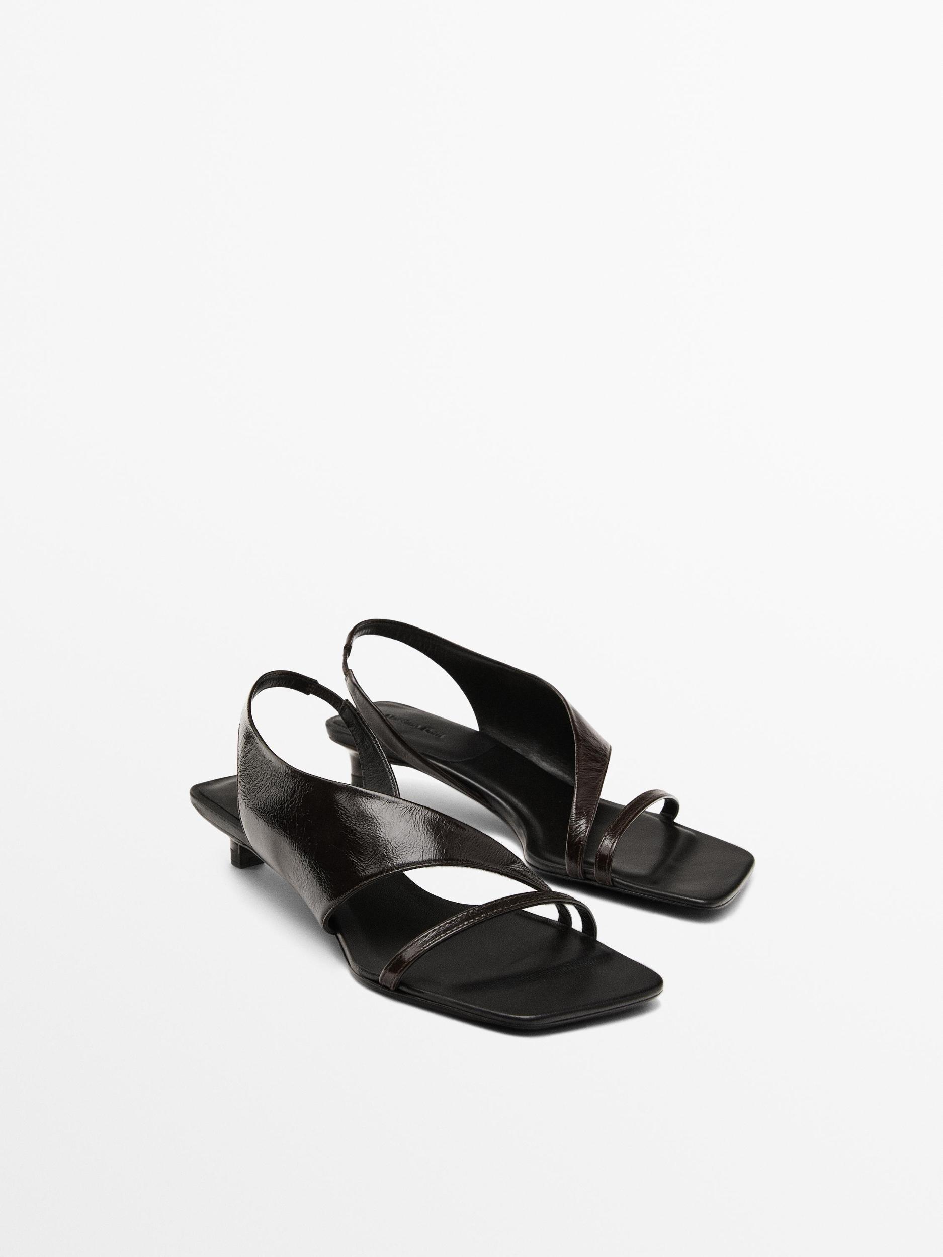 Asymmetric heeled sandals Product Image