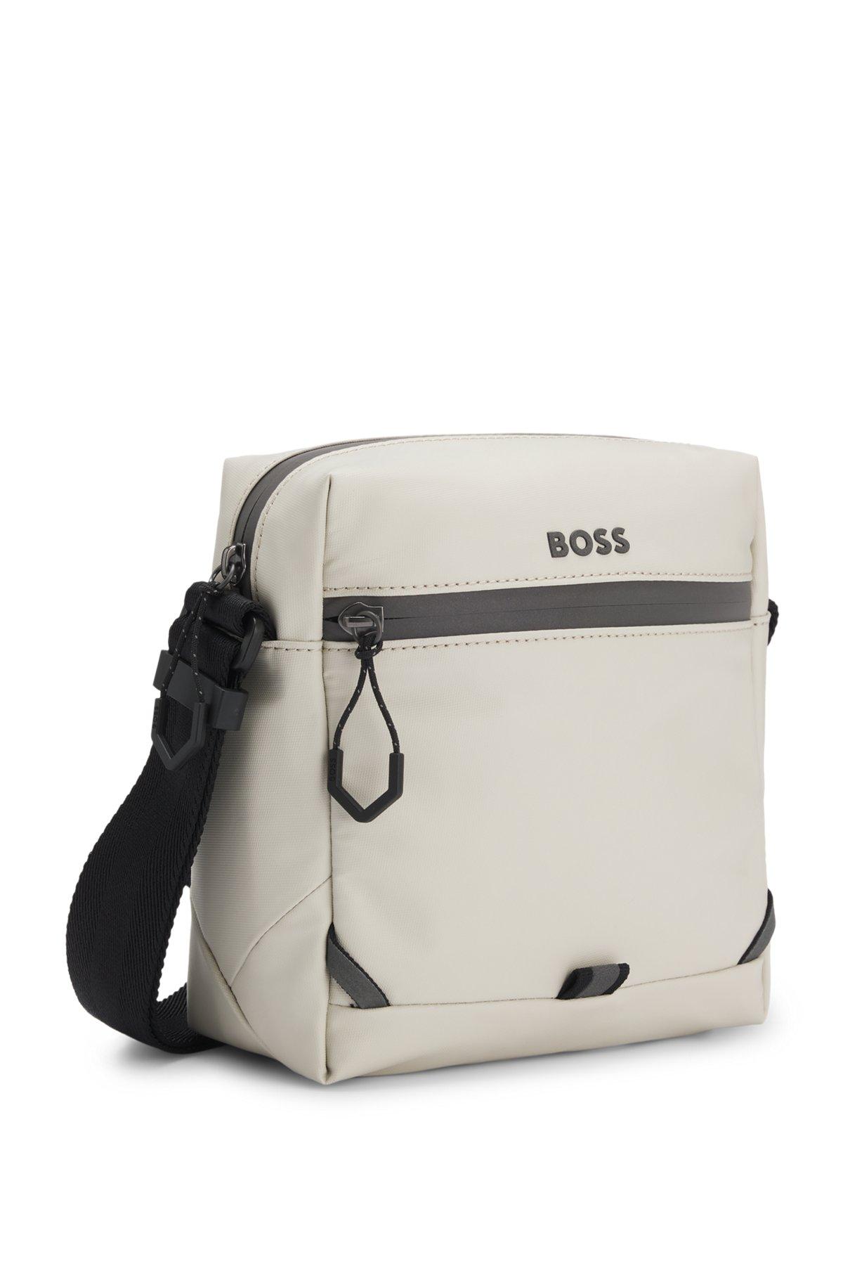 Reflective-detail reporter bag in faux leather Product Image