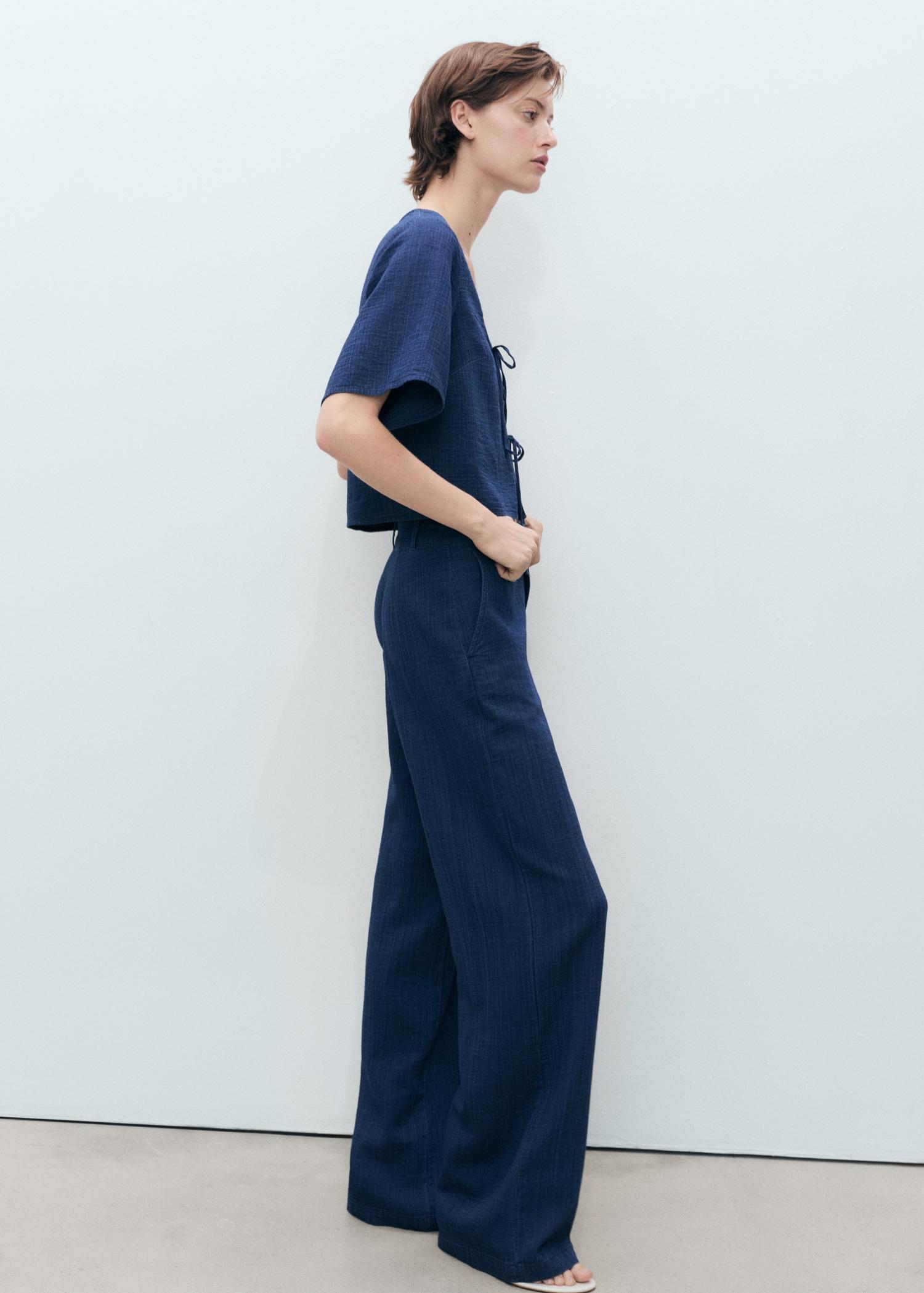 High-waisted denim flowy pants - Women | MANGO USA Product Image