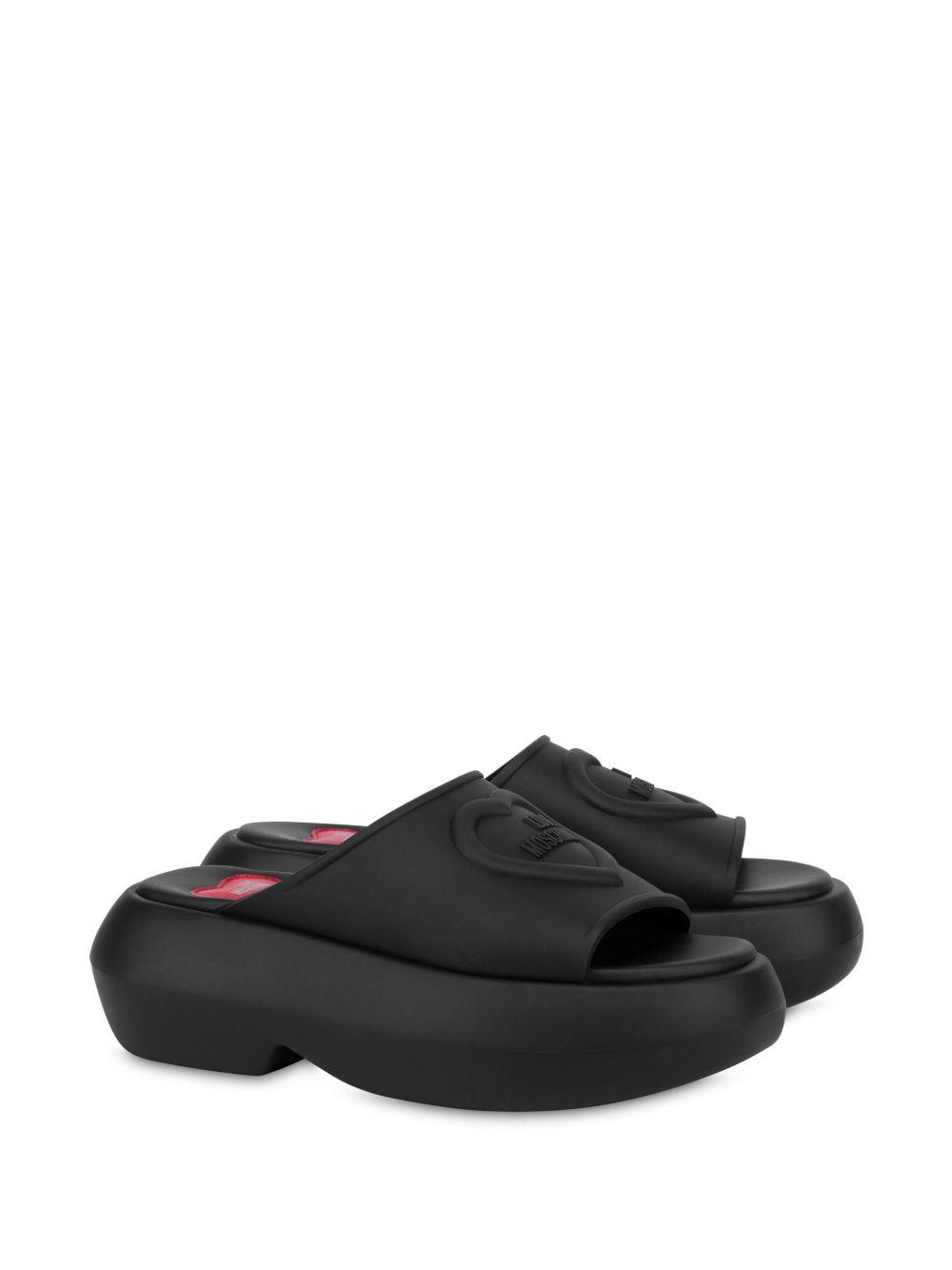 logo-embossed slides Product Image