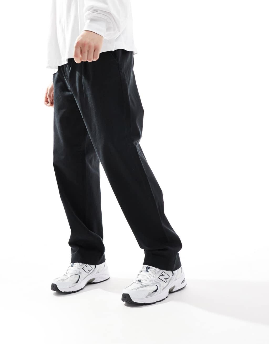 Jack & Jones loose fit pull-on chinos with pleated front in black Product Image