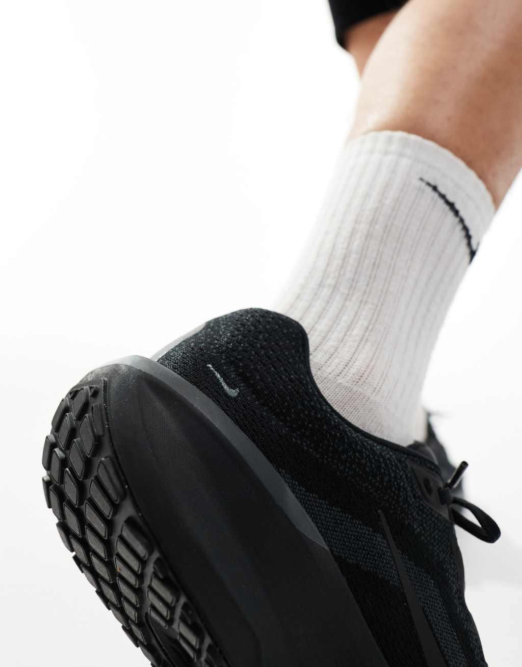 Nike Running Winflo 11 sneakers in black Product Image