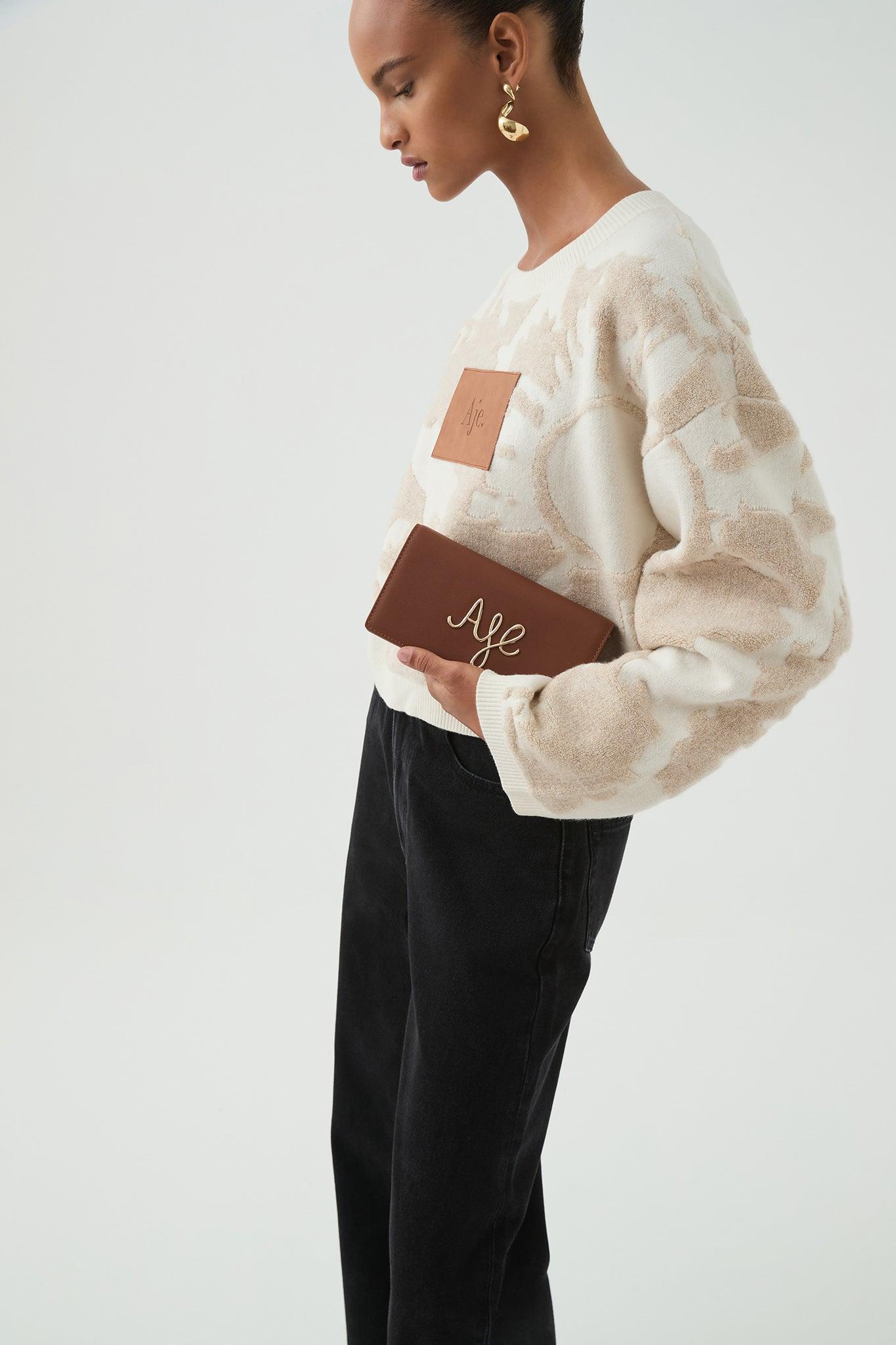 Joni Logo Chain Clutch Product Image