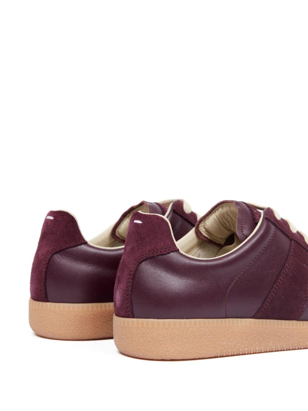 Replica low-top leather sneakers Product Image