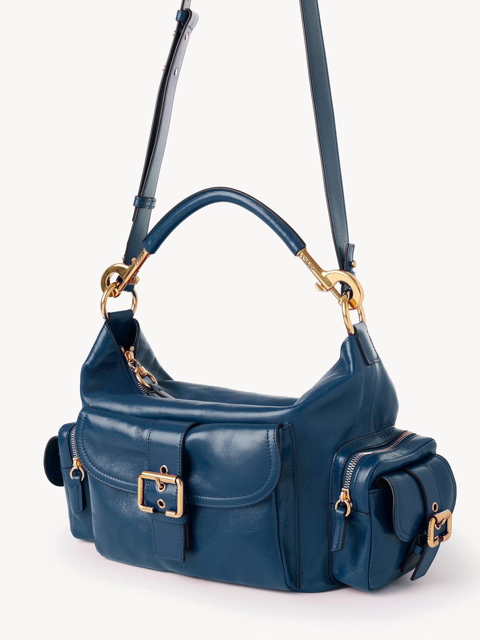 Camera bag in shiny leather Product Image