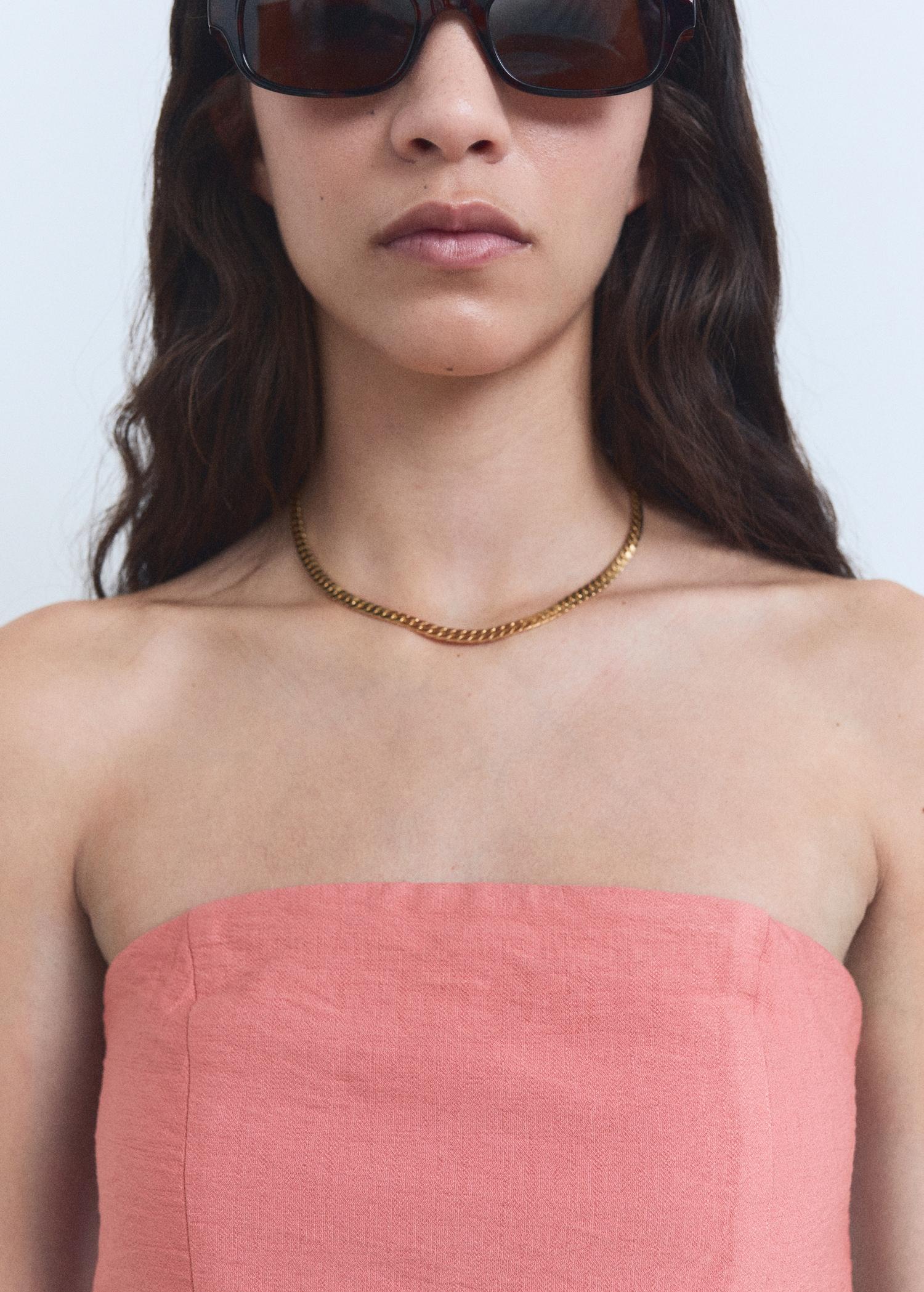 Asymmetrical strapless top - Women | MANGO USA Product Image