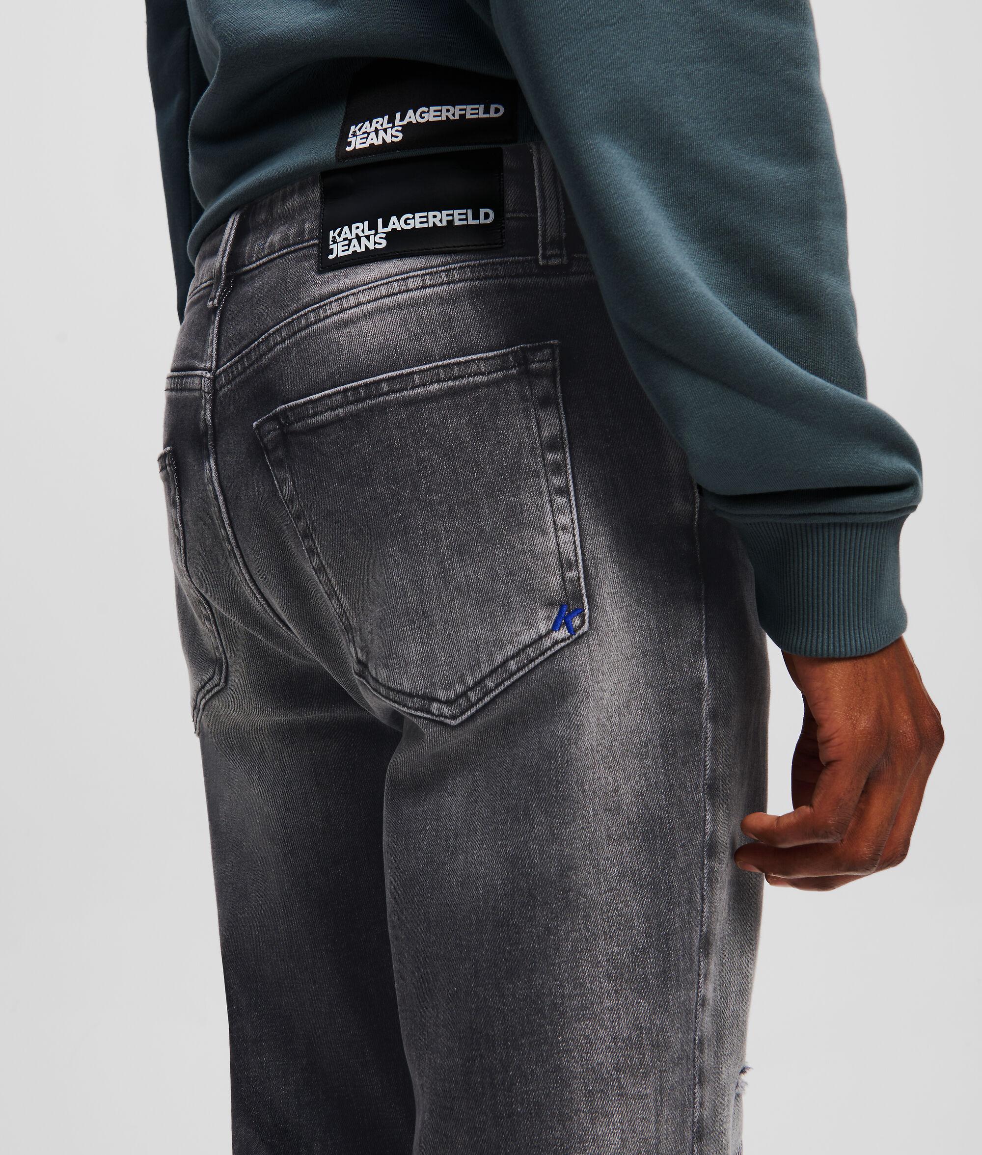 DISTRESSED SLIM JEANS Product Image