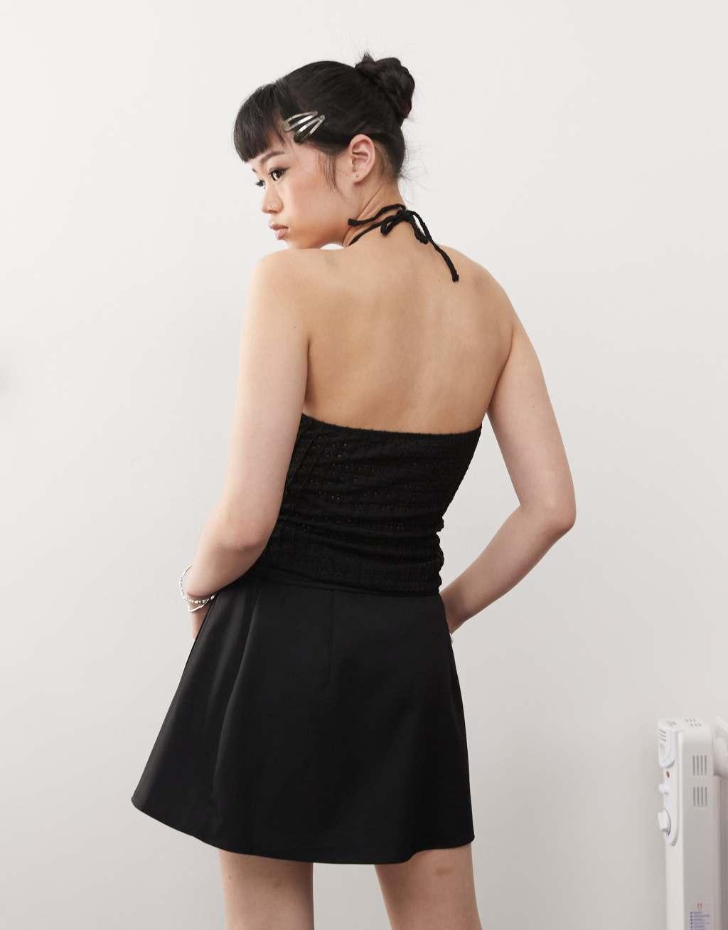 Monki mini wrap skirt in black Product Image