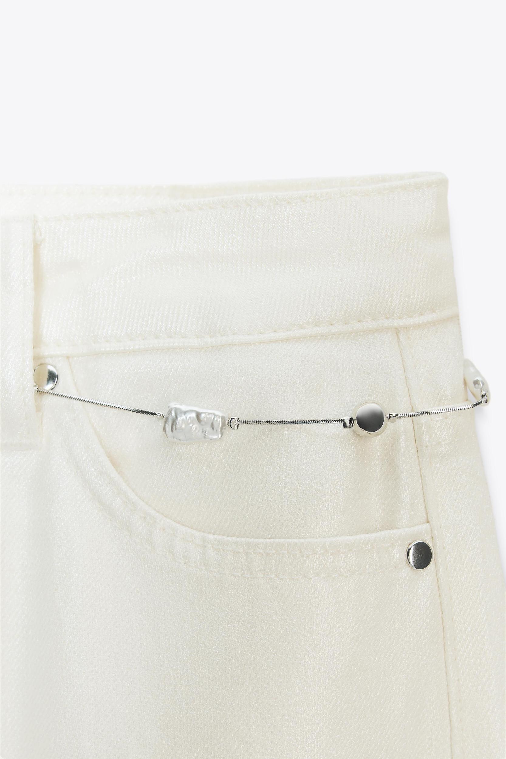 Z1975 PEARLESCENT BELTED JEANS Product Image