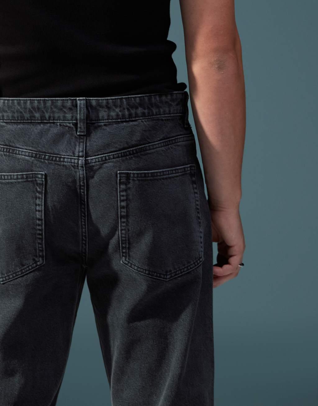 ASOS DESIGN wide flare jeans in washed black Product Image