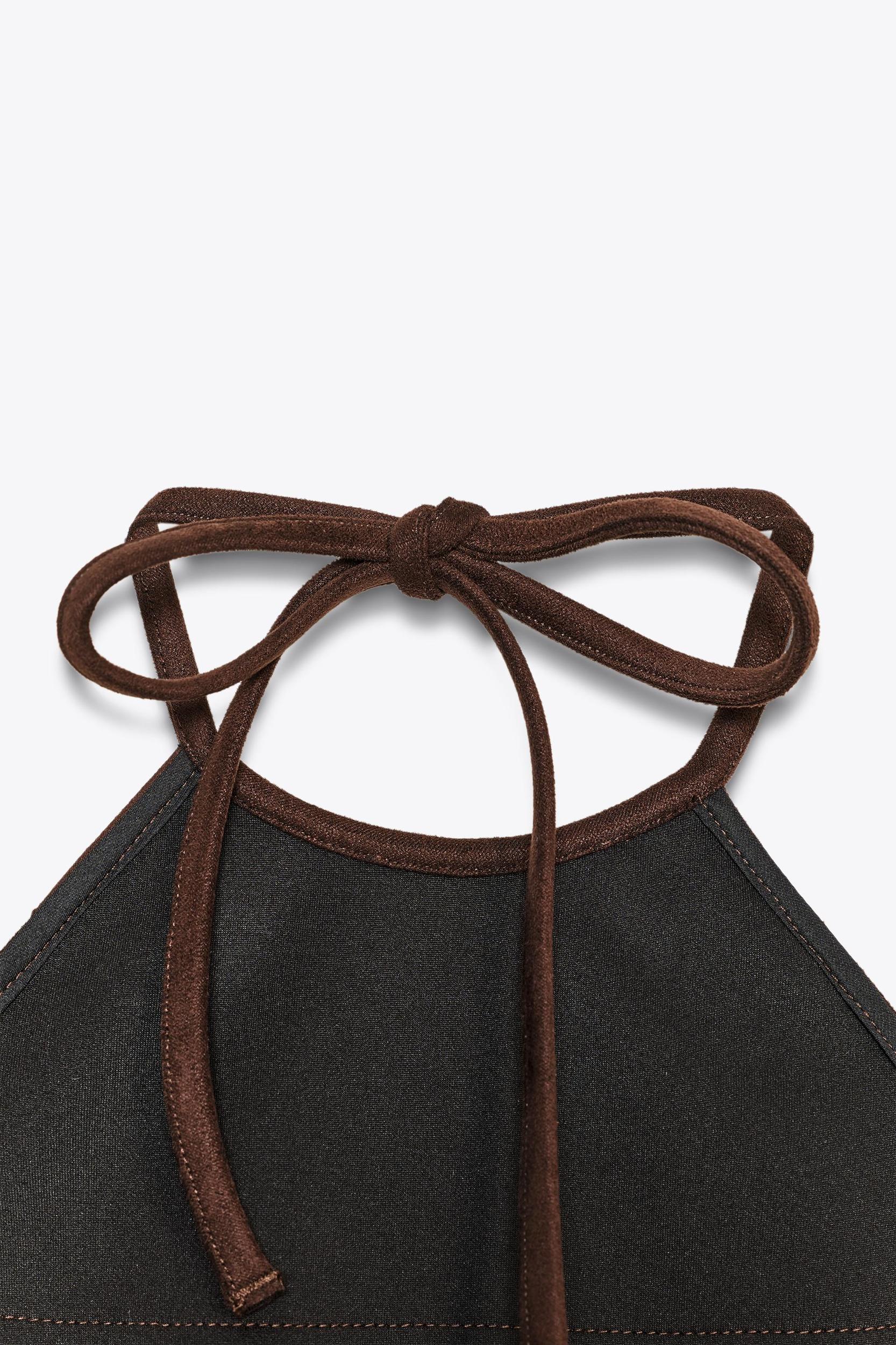 SHIMMER FAUX SUEDE FRINGE TOP Product Image