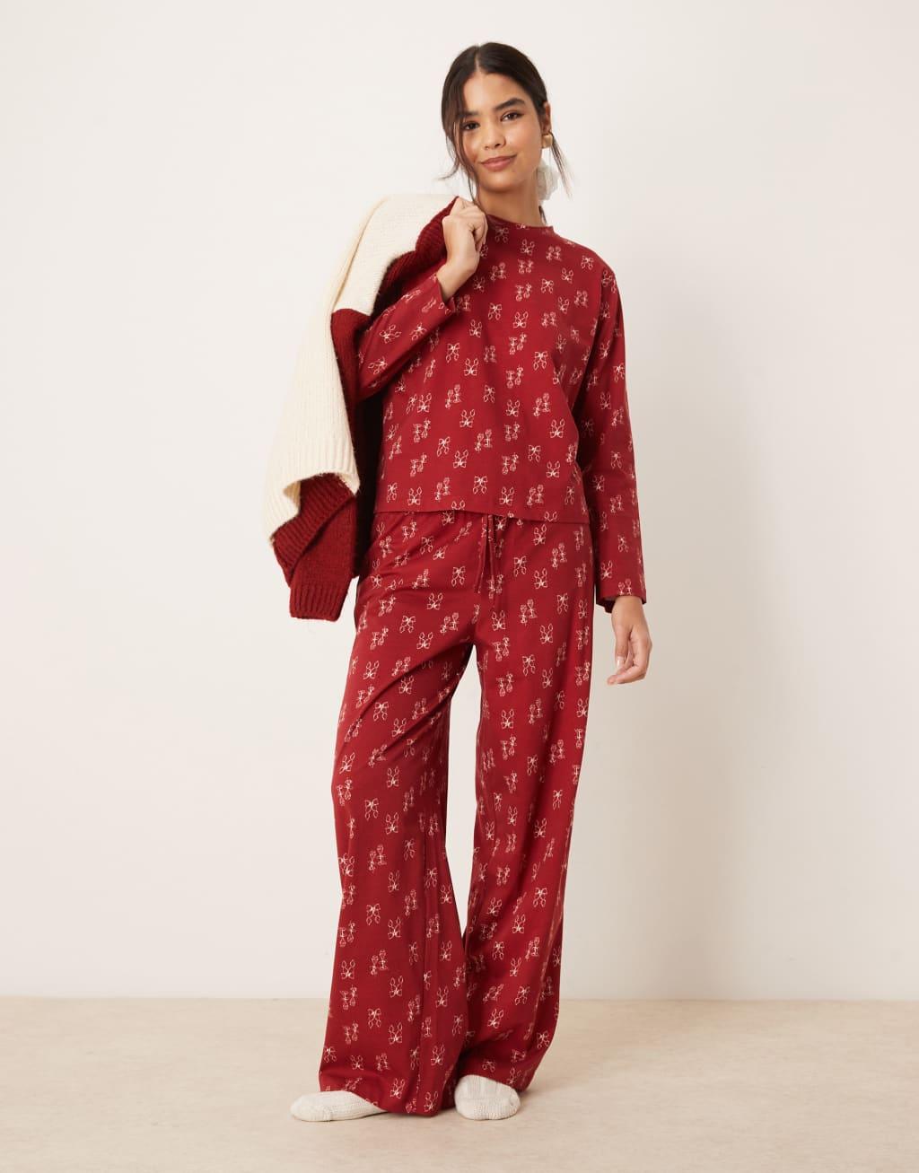 ASOS DESIGN top and pants pajama set in red bow print Product Image