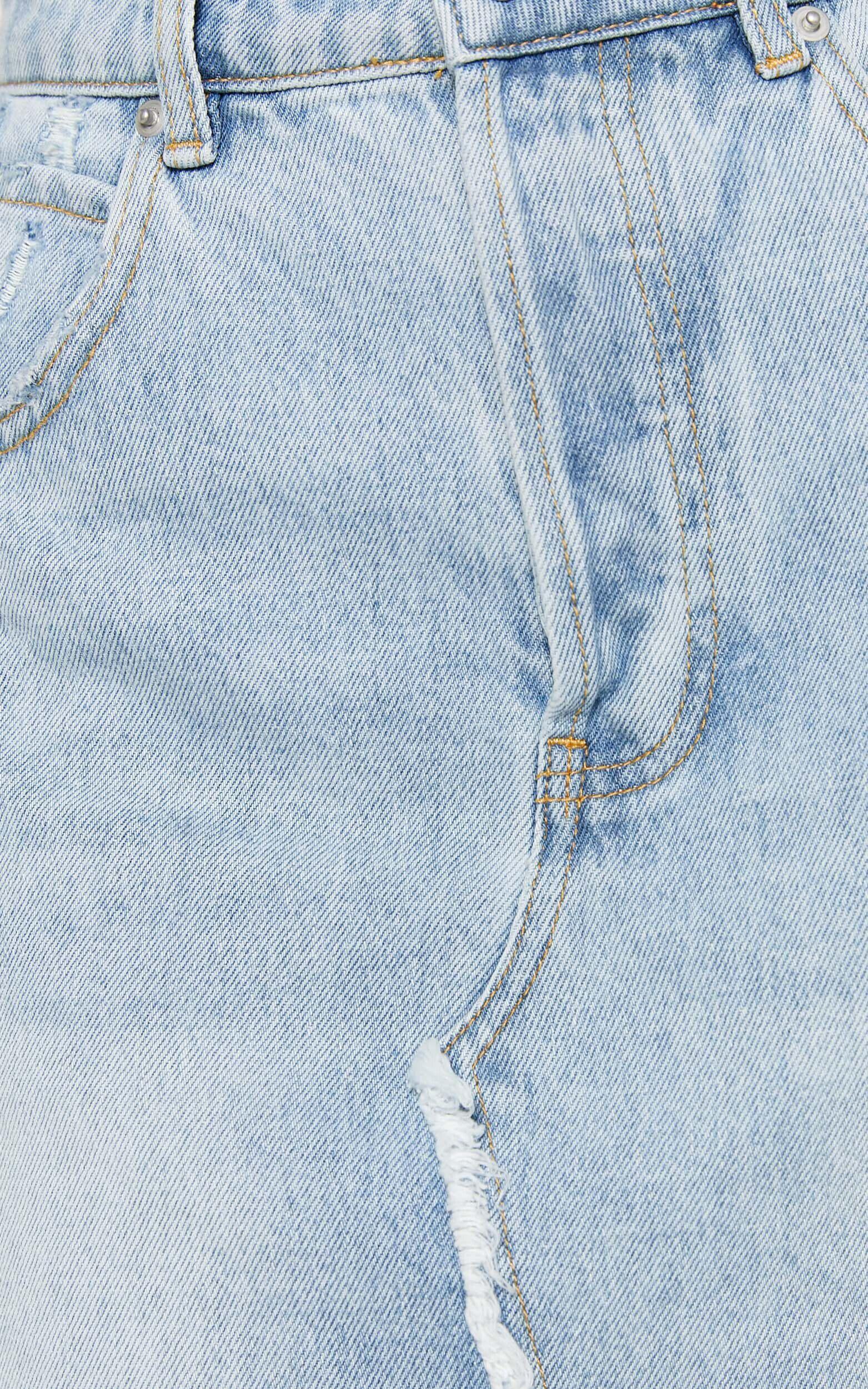 Pieta Mini Skirt - Recycled Cotton Raw Hem Denim Skirt in Mid Blue Wash Product Image