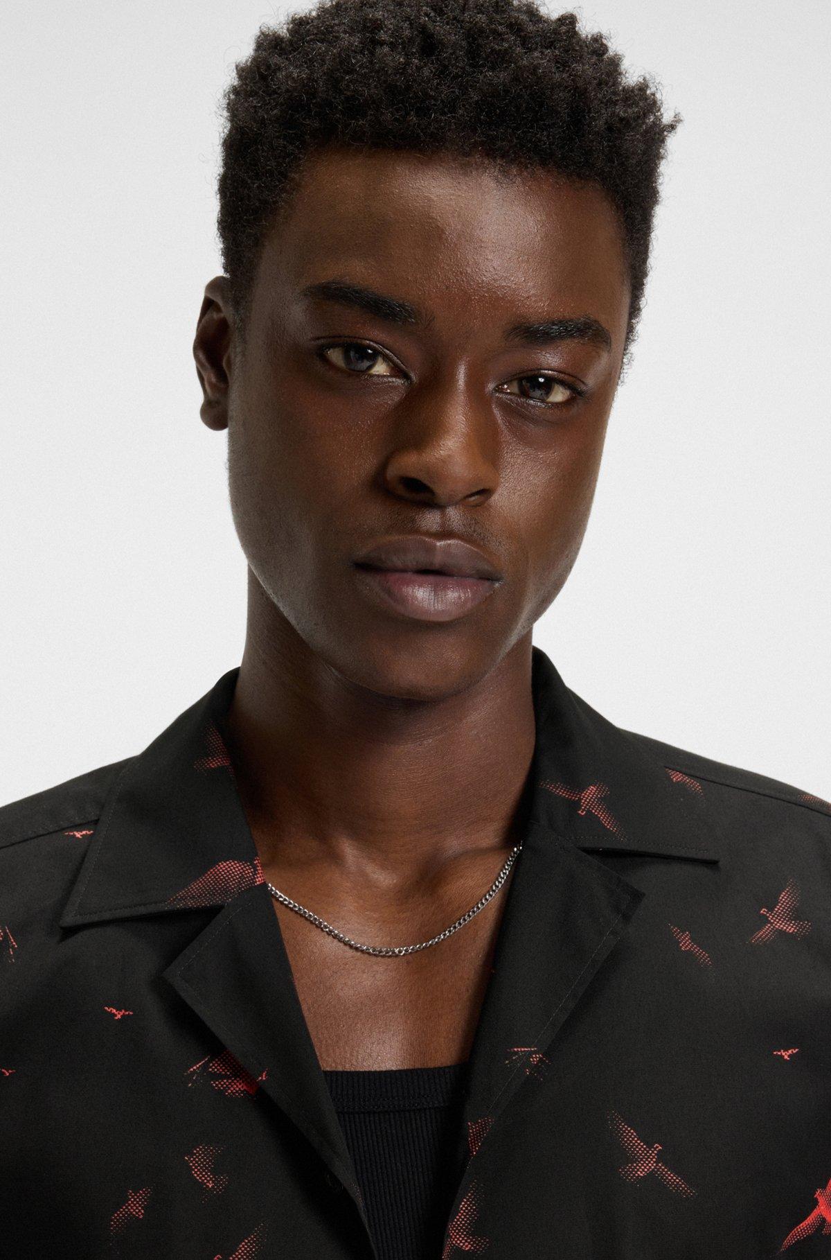 HUGO - Relaxed-fit shorts in printed cotton poplin - Black Product Image