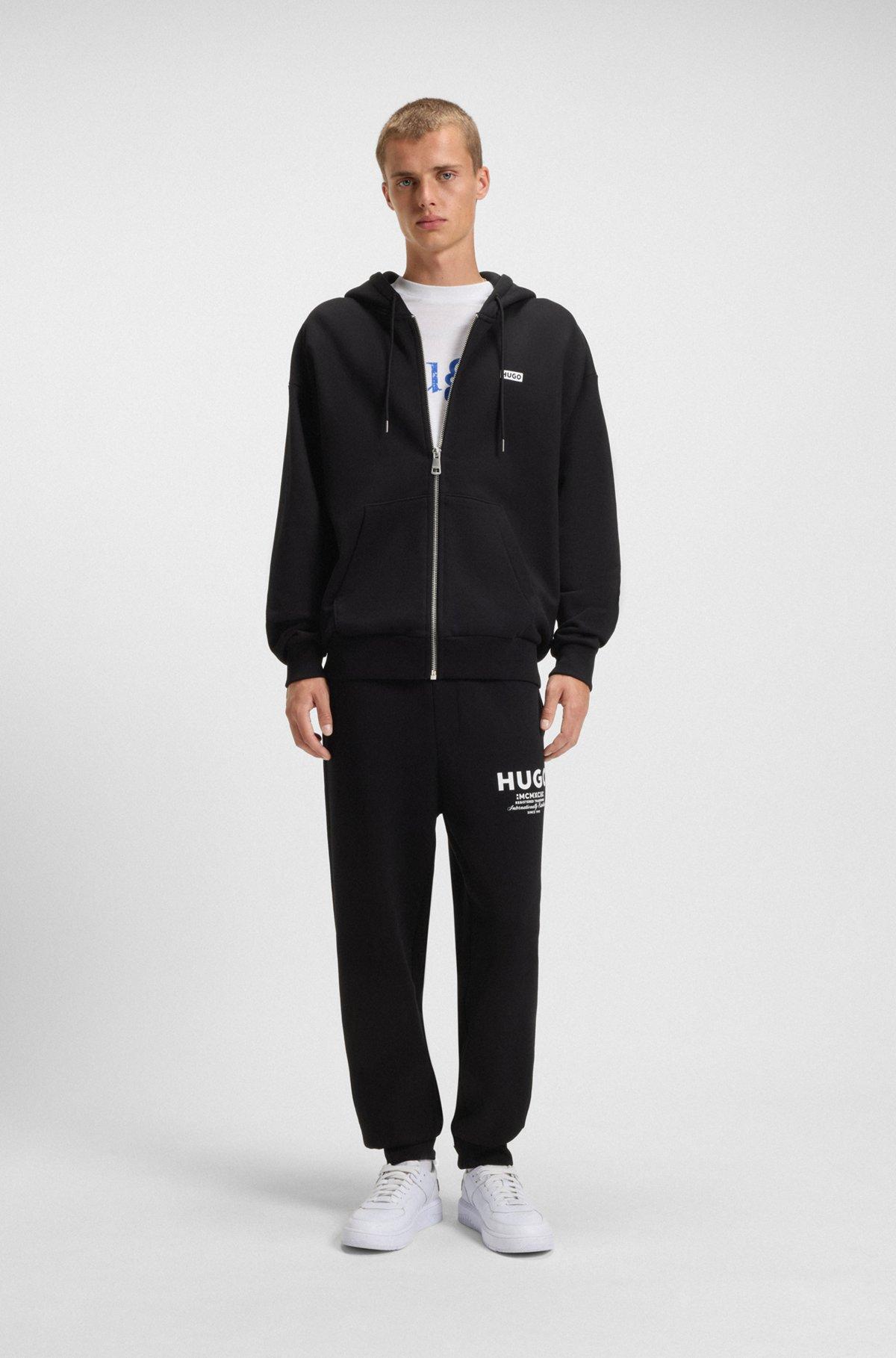 Cotton-terry tracksuit bottoms with logo print Product Image