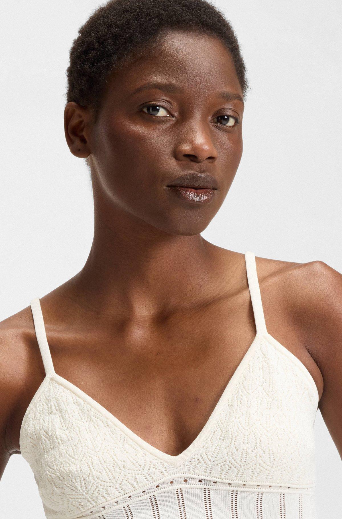 Knitted top in stretch fabric with mixed structures Product Image