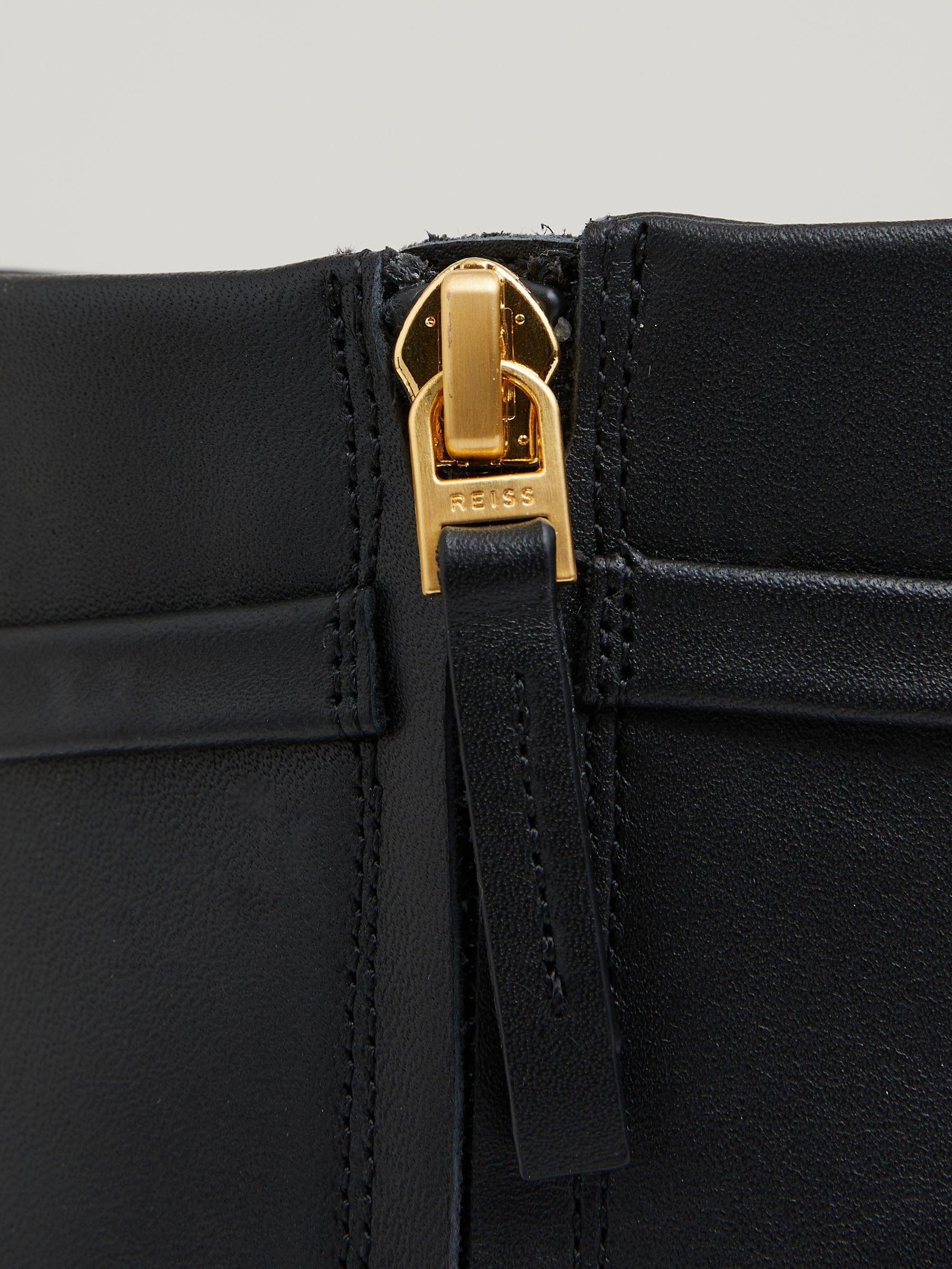 Leather Chain Embellished Ankle Boots in Black Product Image