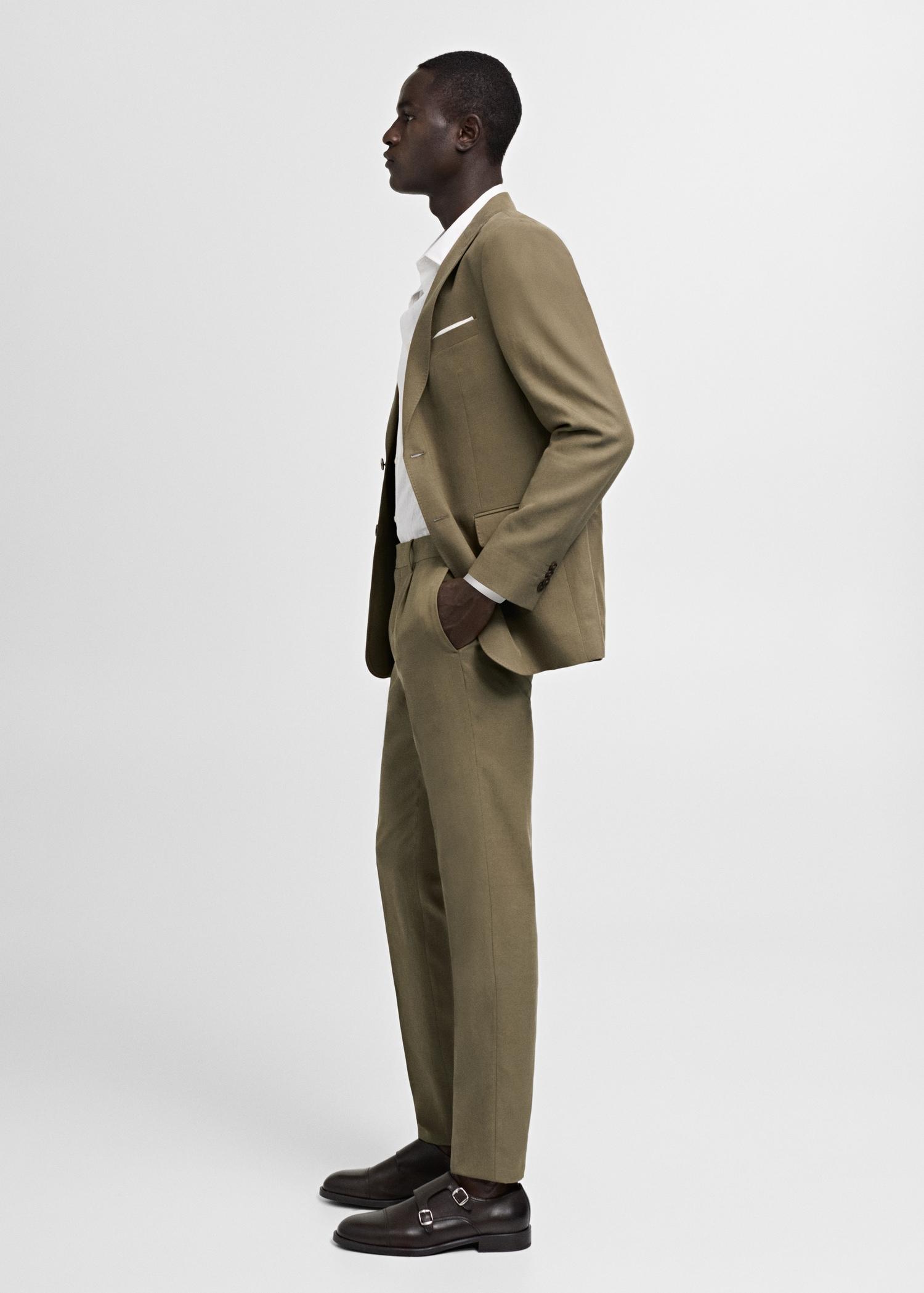 Slimfit Tencel™ suit pants with pleats - Men | MANGO USA Product Image