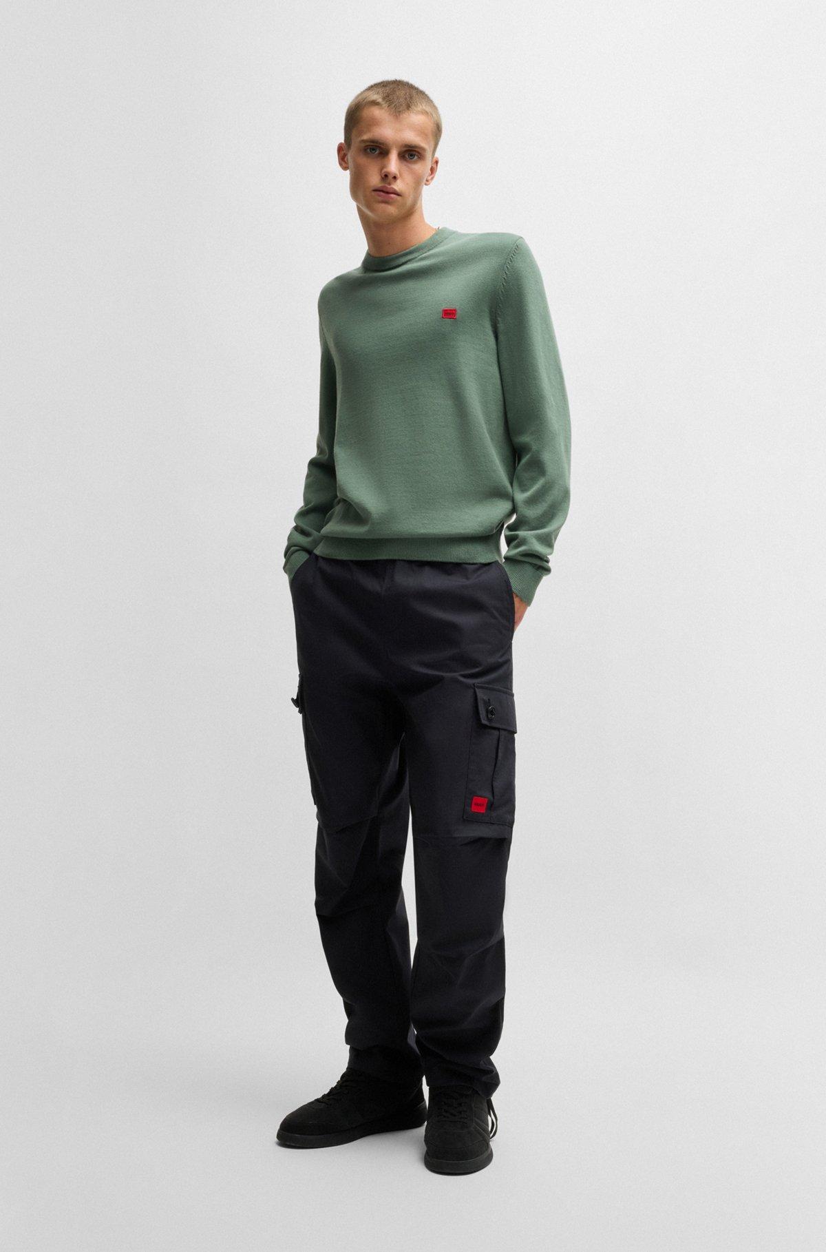 Cotton sweater with red logo label Product Image