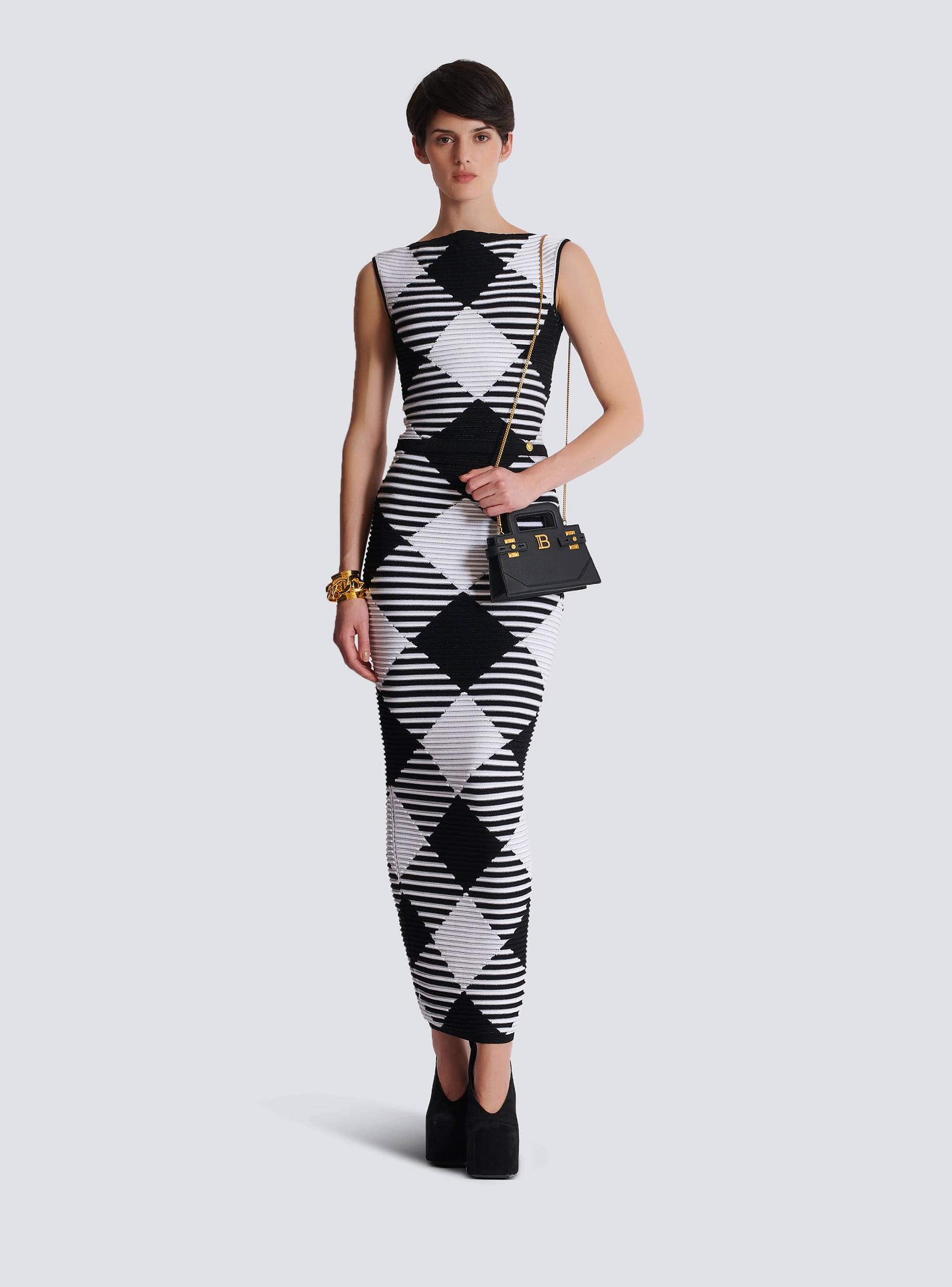 Small B-Buzz Top Handle bag in grained leather Product Image