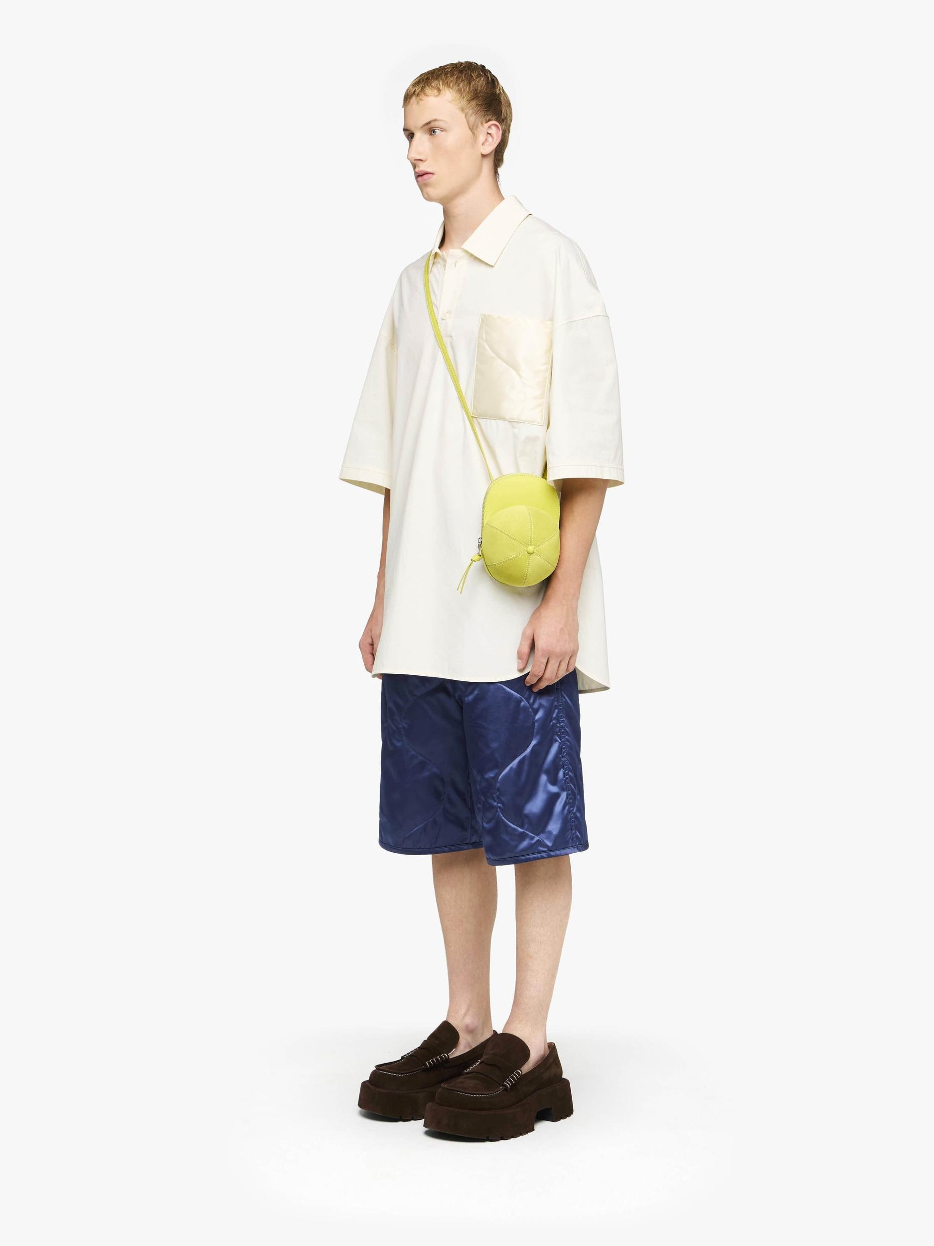 QUILTED POCKET POLO TOP Product Image