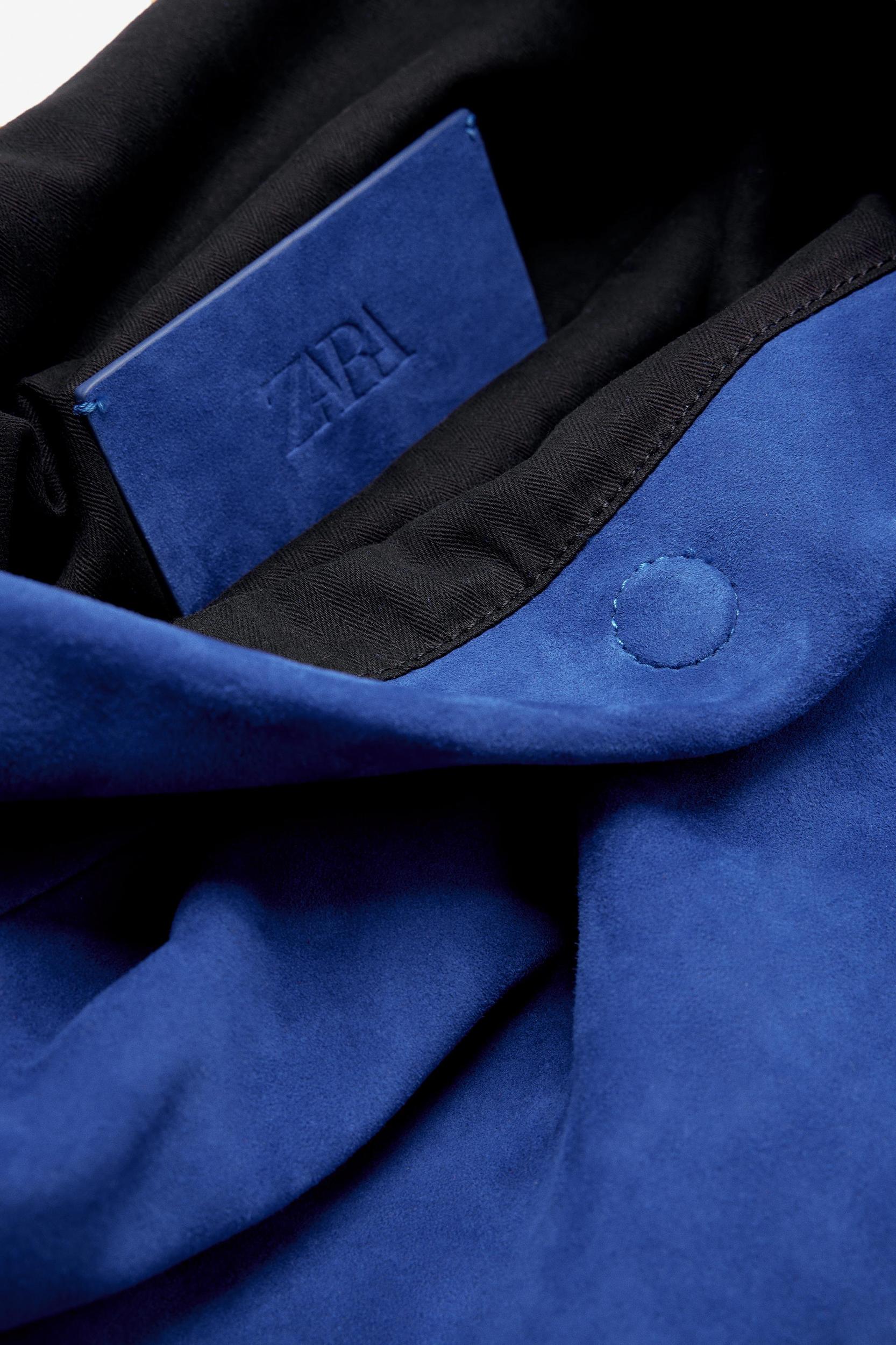 LIMITED EDITION MAXI SUEDE CLUTCH Product Image