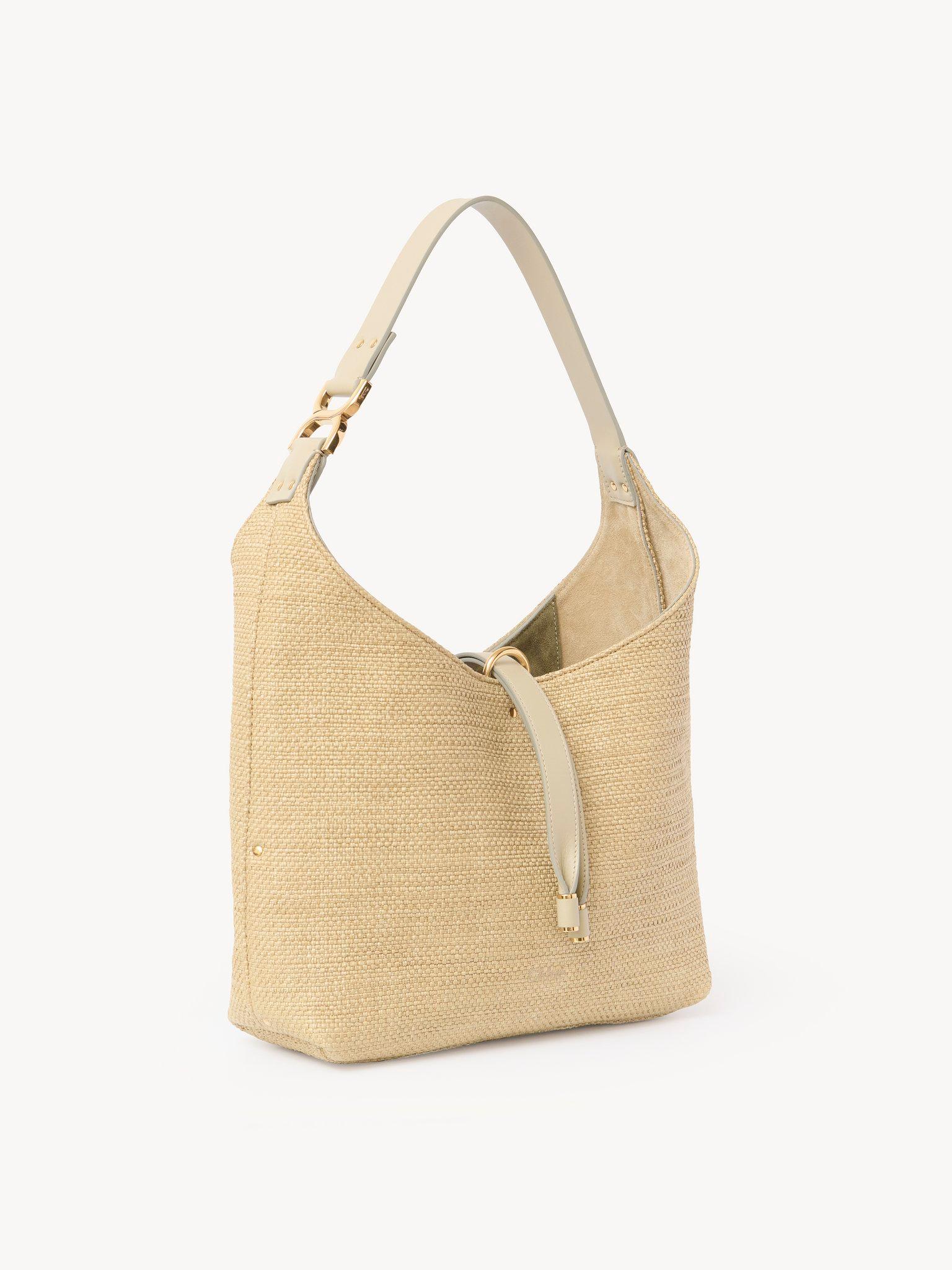 Small Marcie hobo bag in raffia-effect fibers Product Image