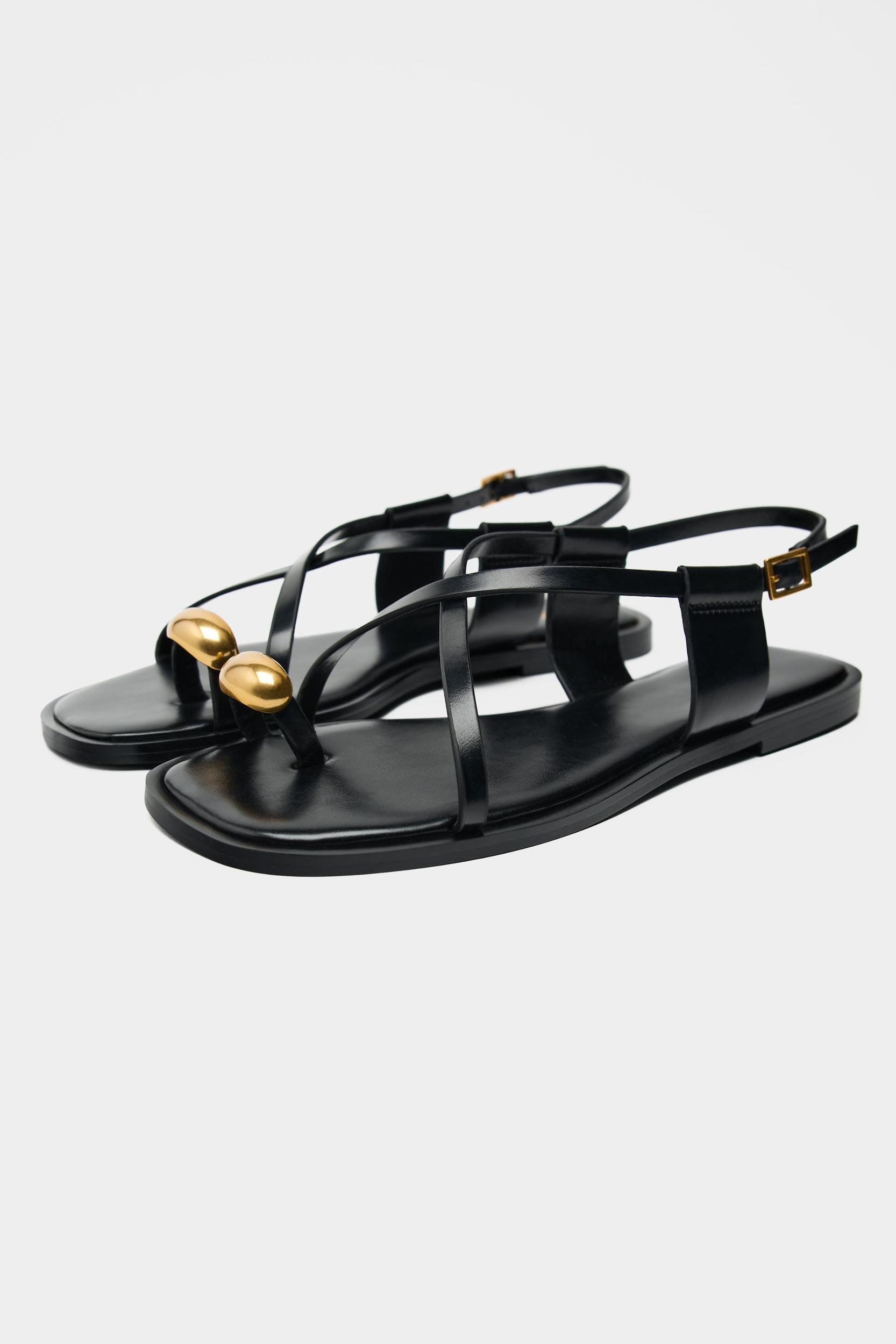 FLAT STRAPPY SANDALS WITH METAL ORNAMENT Product Image