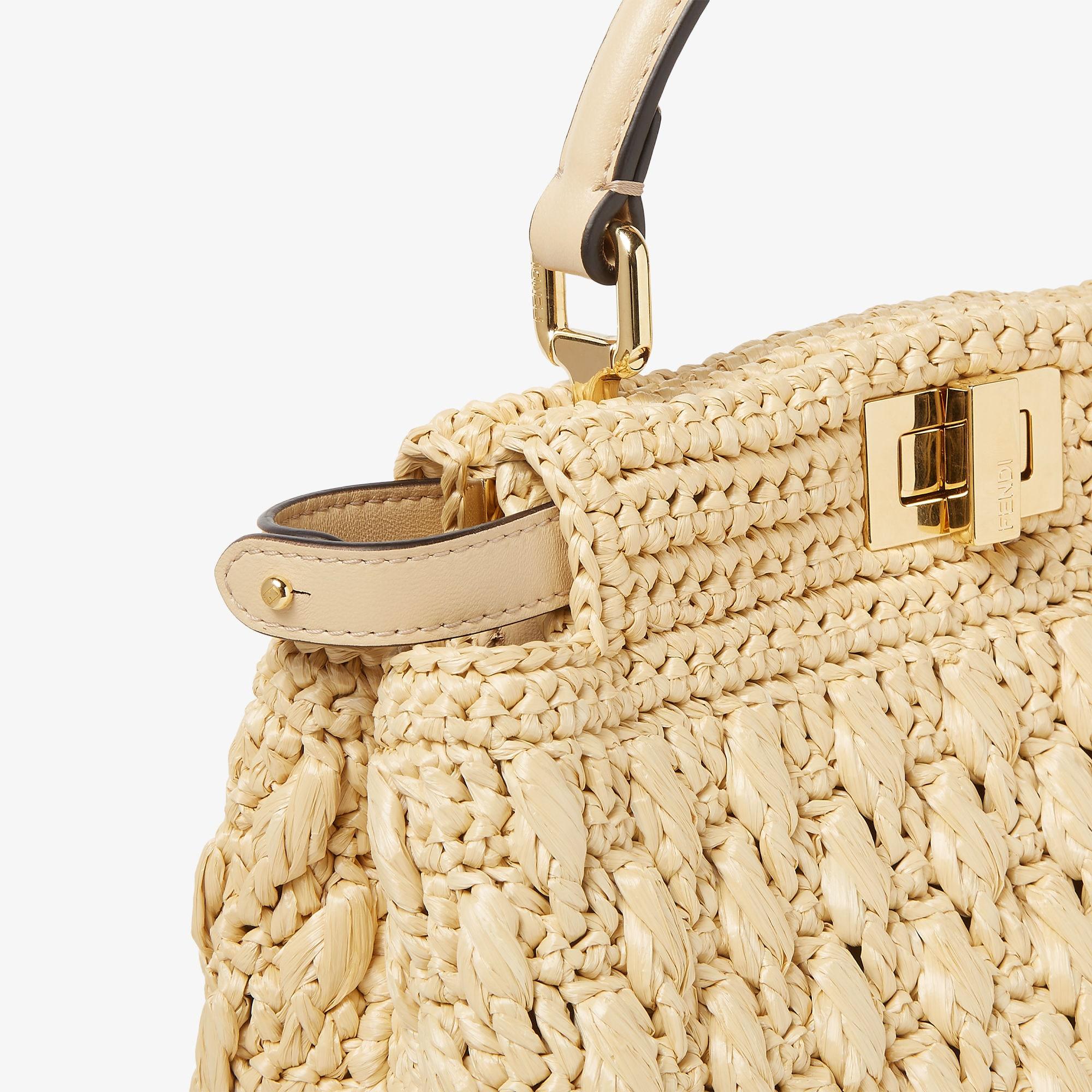 Nano Baguette CharmJacquard fabric charm with raffia FF Product Image