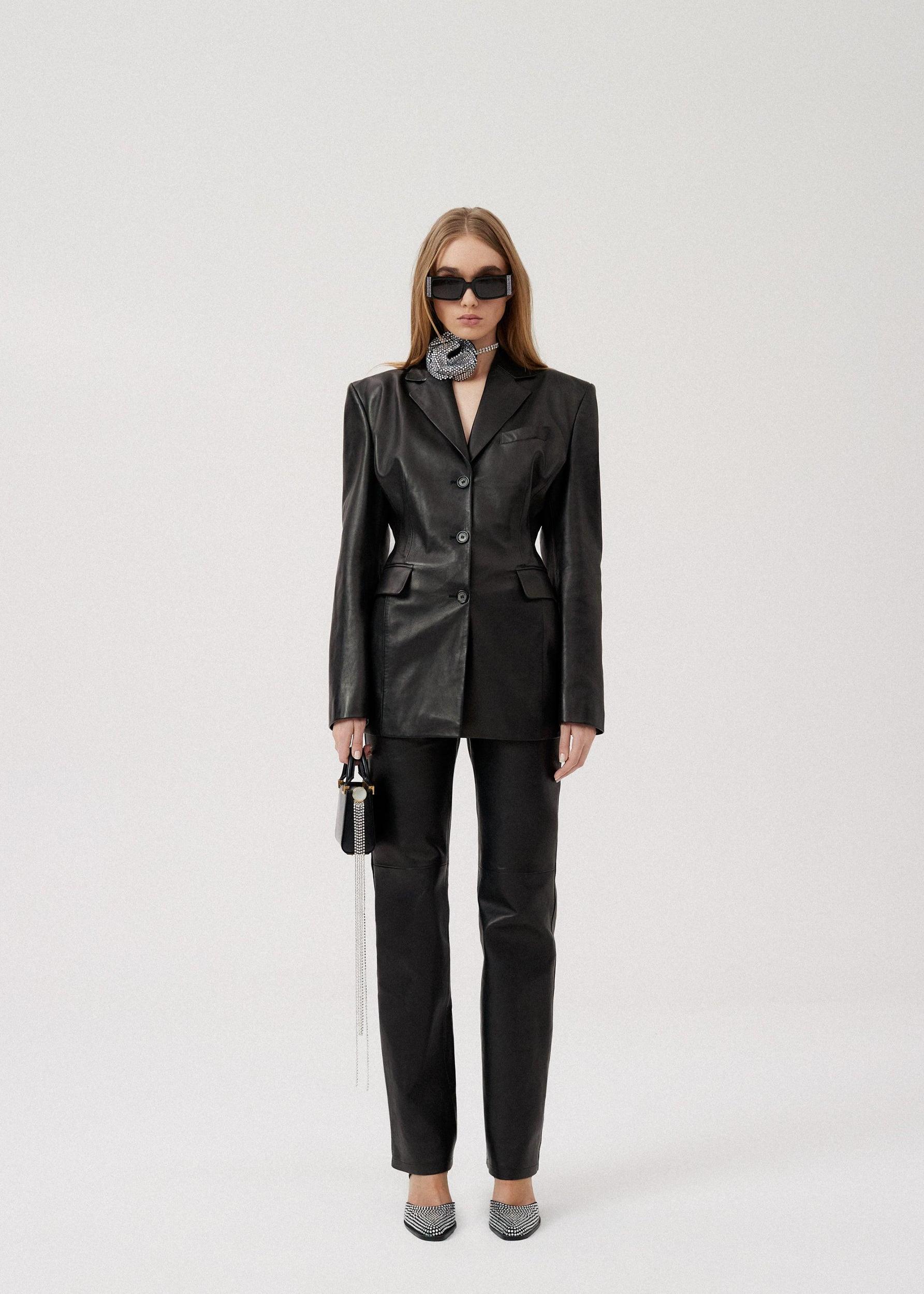 Flared leather pants in black Product Image