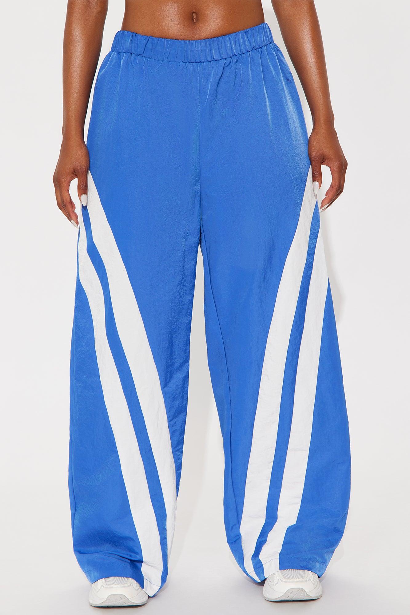 Follow The Curve Windbreaker Track Pant - Blue Female Product Image