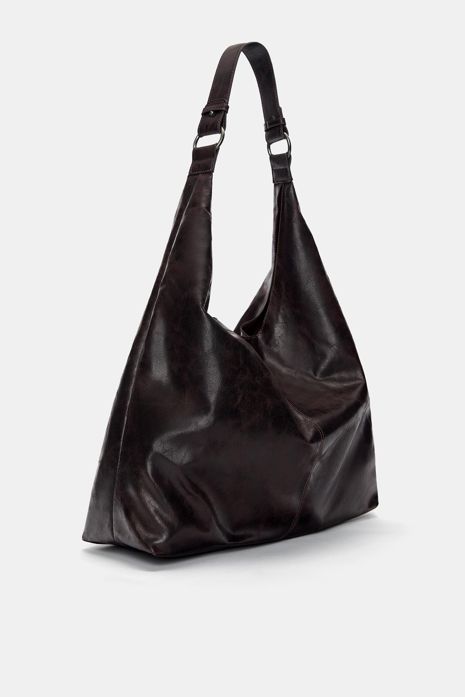 Distressed shopper bag with rings Product Image