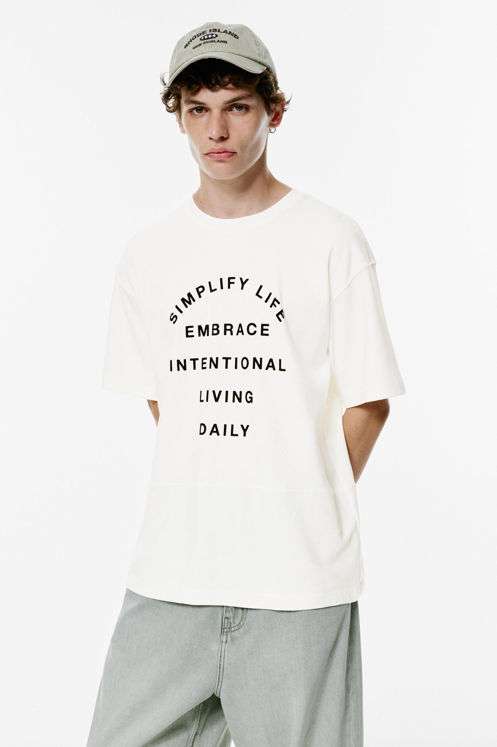 Short sleeve sweatshirt with slogan Product Image