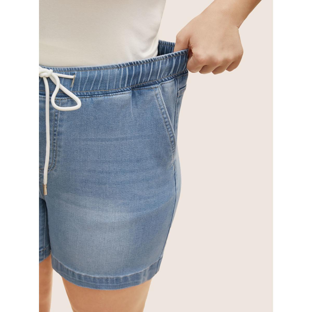 Plus Size Light Wash Elastic Waist Drawstring Denim Shorts Women Denimlightblue Drawstring Medium stretch Everyday Slanted pocket Casual Denim Shorts BloomChic 18/2X Product Image