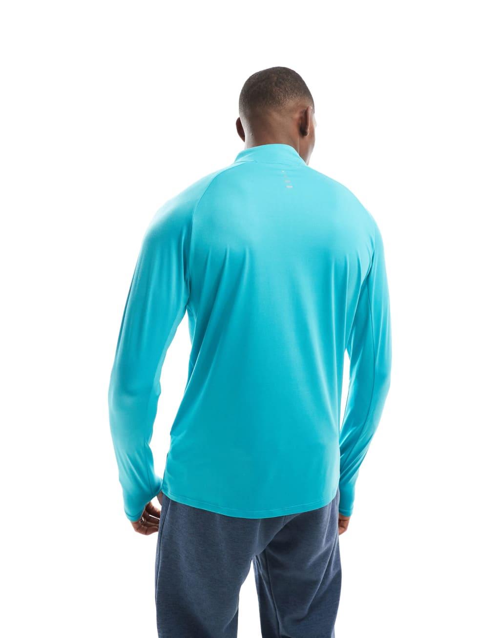 Nike Running Stride half zip sweatshirt in light blue Product Image
