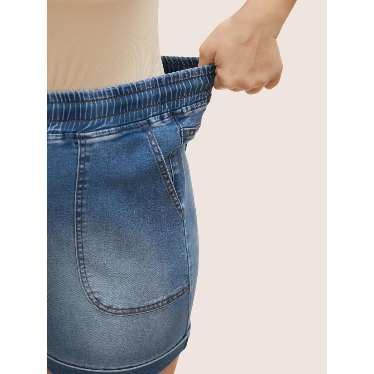 Plus Size Medium Wash Drawstring Roll Hem Denim Shorts Women Midblue Roll Hem High stretch Everyday Slanted pocket Casual Denim Shorts BloomChic 12/L Product Image