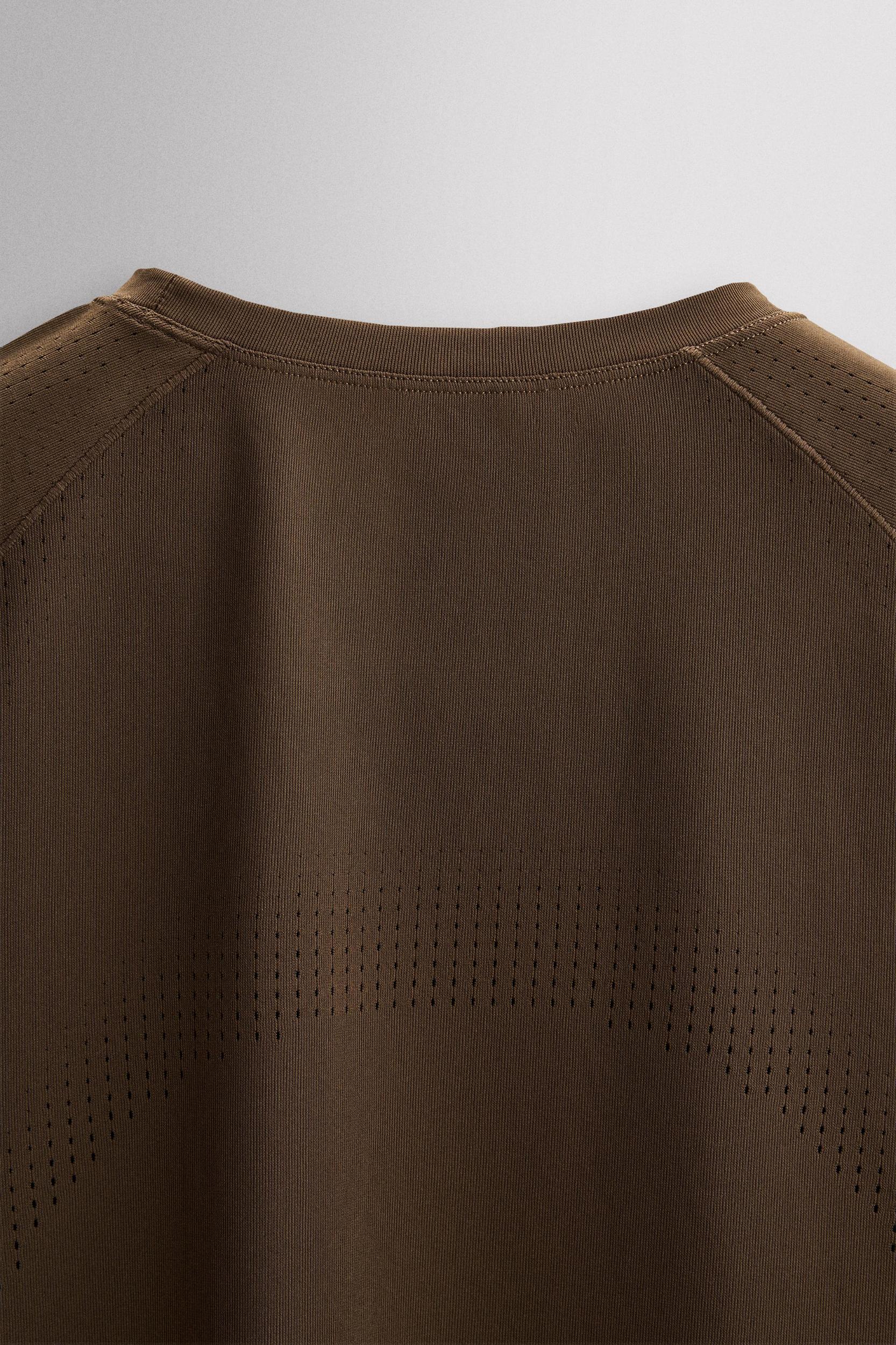 OPEN KNIT STRUCTURE T-SHIRT Product Image
