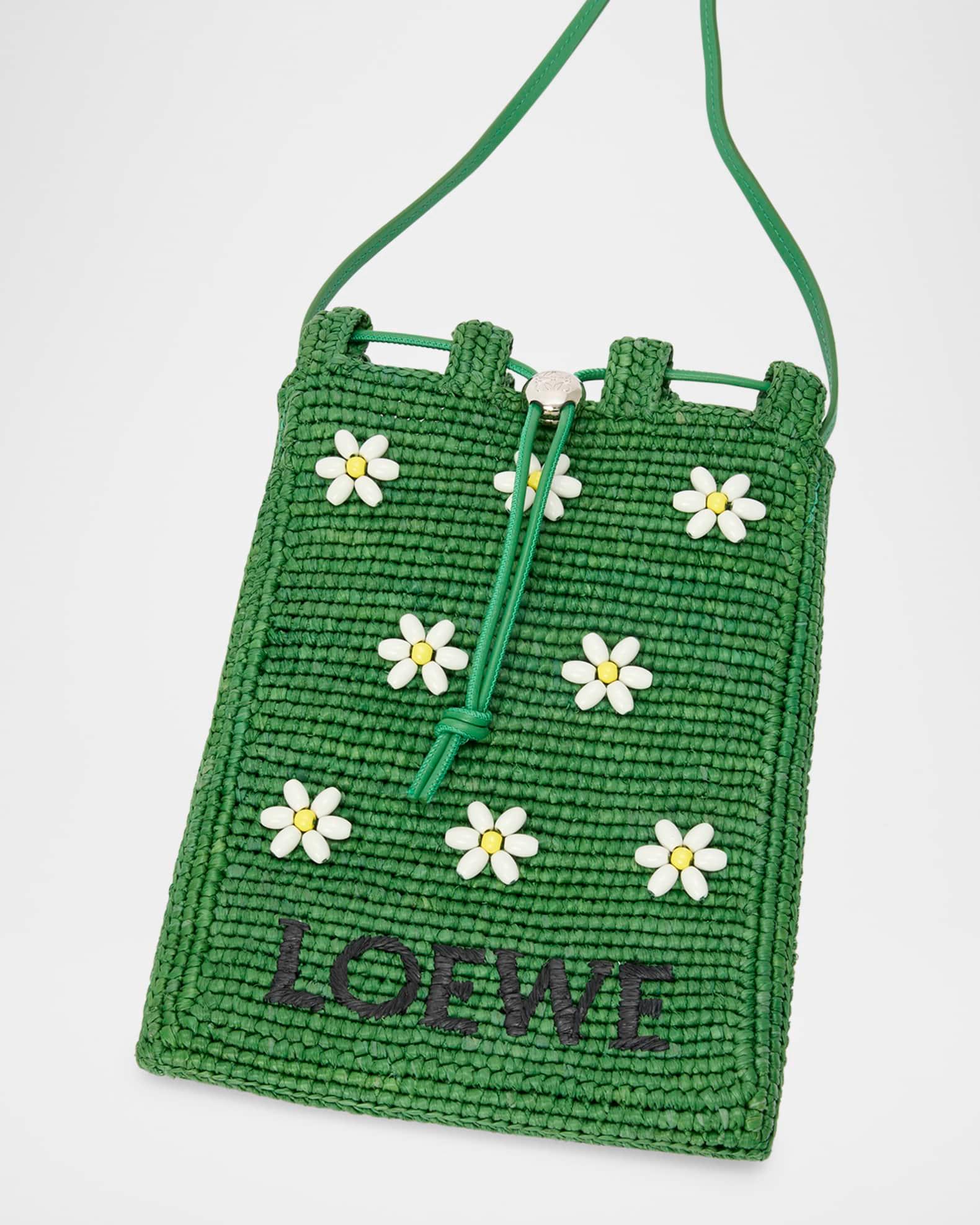 x Paula’s Ibiza Drawstring Pocket Flower Crossbody Bag in Raffia Product Image