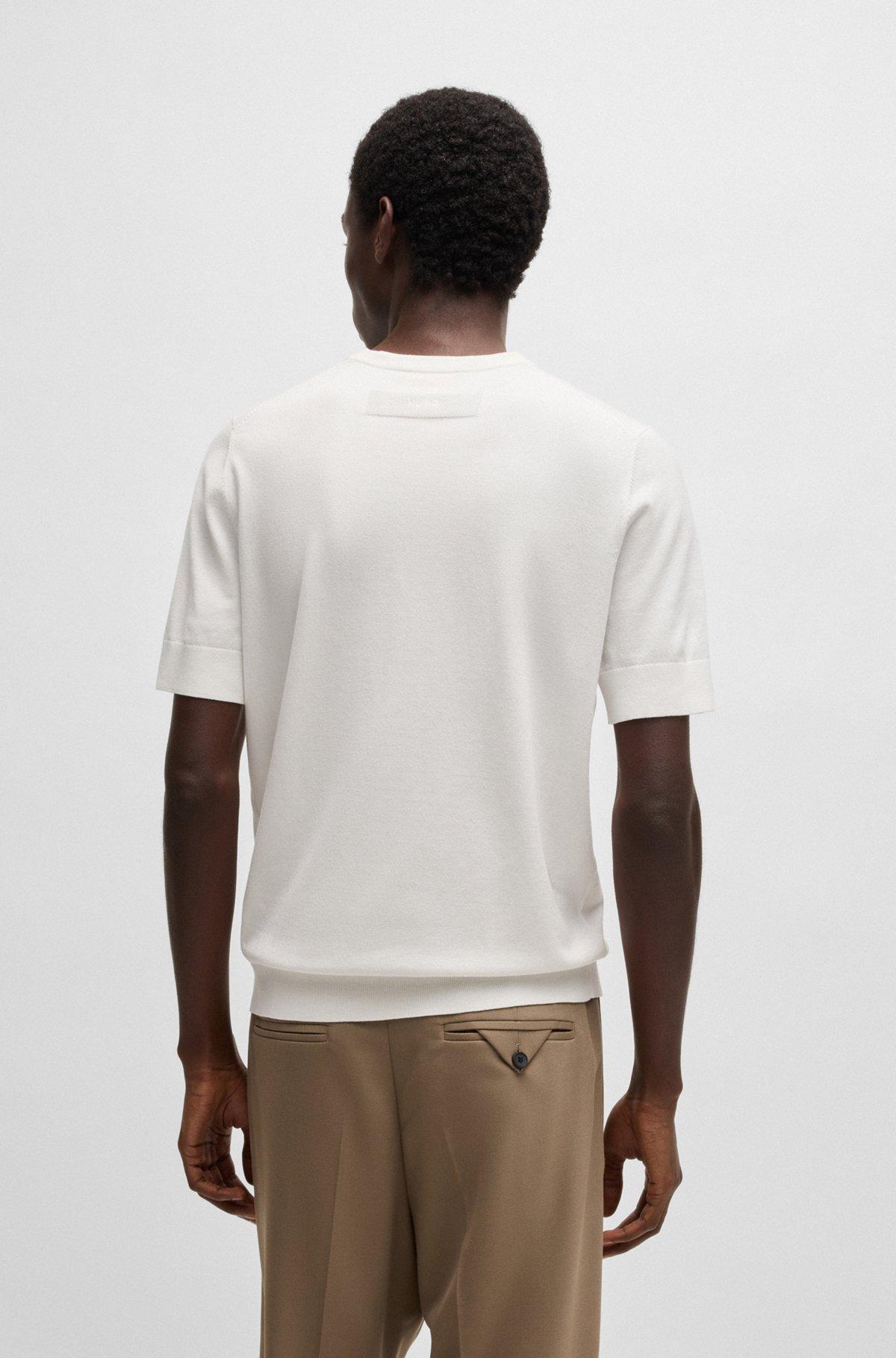 Slim-fit knitted sweater with short sleeves Product Image