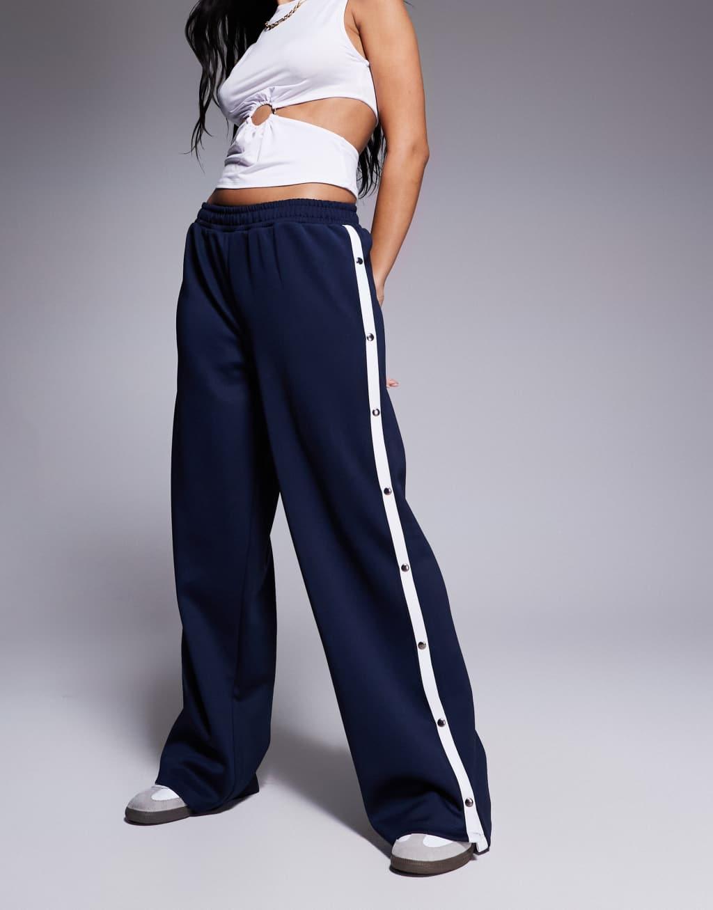 ASOS DESIGN wide leg pants with stripe and snaps in navy Product Image