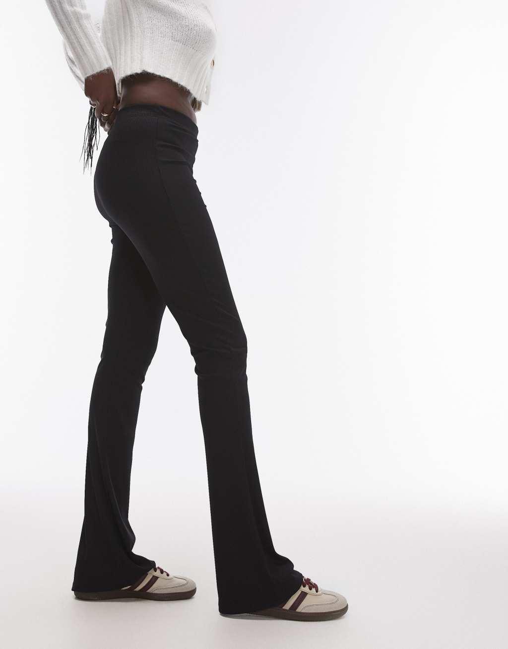 Topshop Tall skinny ribbed flared pants in black Product Image
