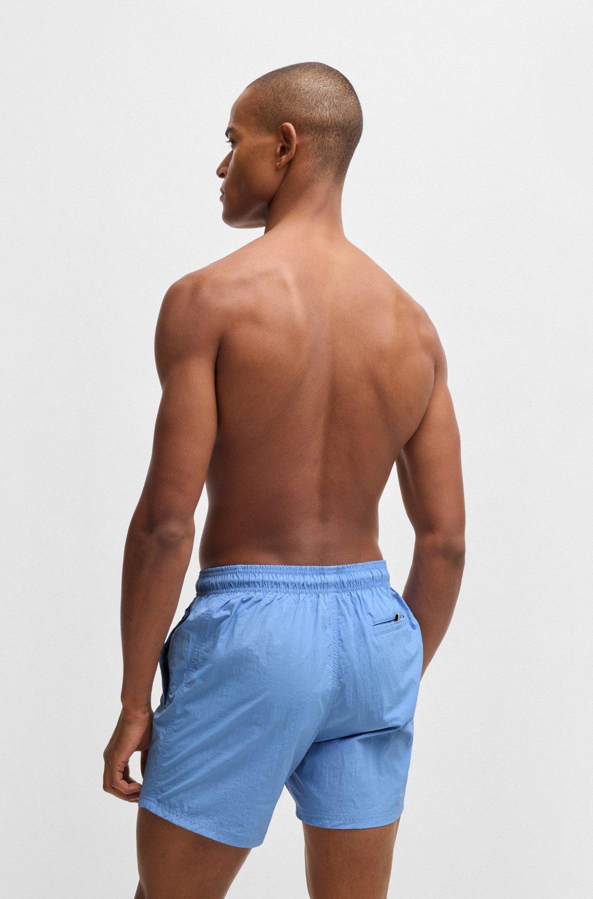 BOSS - Fully lined swim shorts with logo print - Blue Product Image