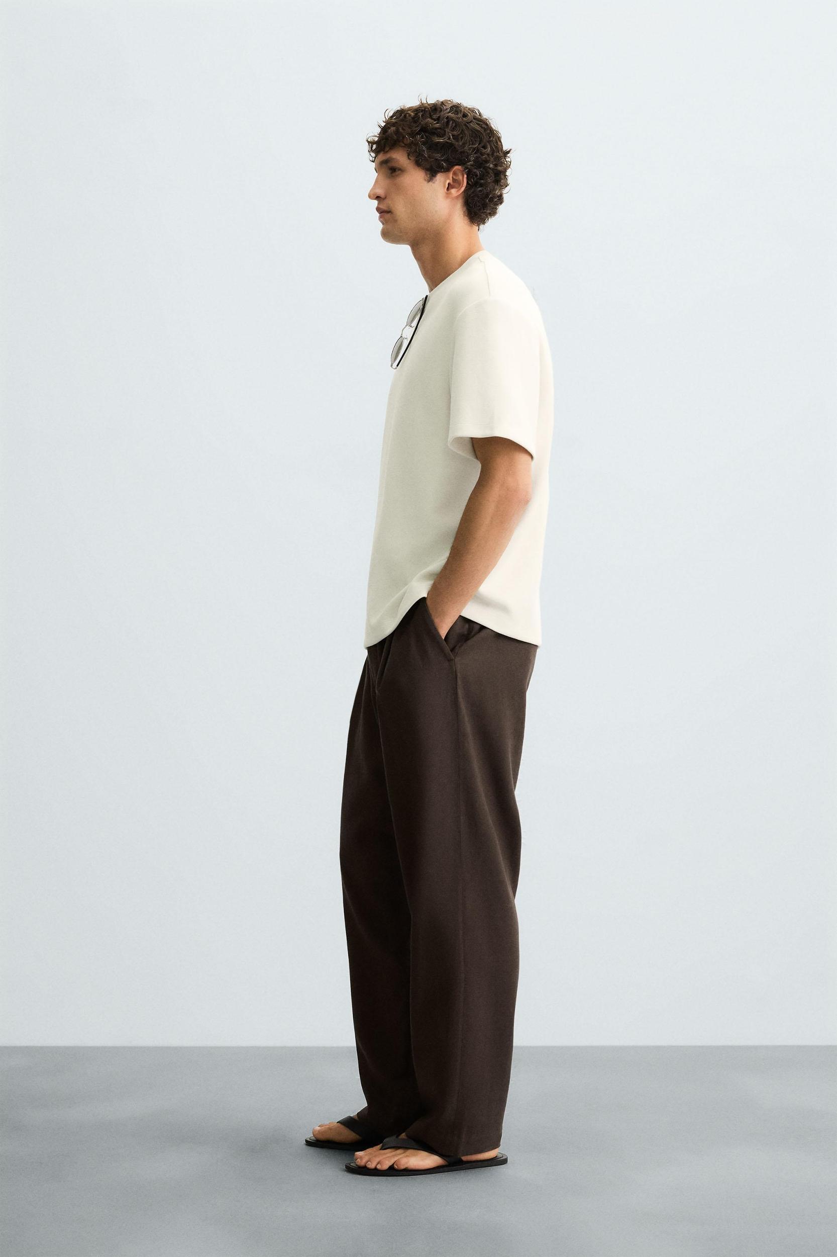 FLOWY PLEATED PANTS Product Image