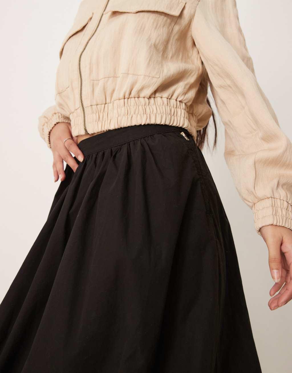 ASOS DESIGN puff ball midi skirt in black Product Image
