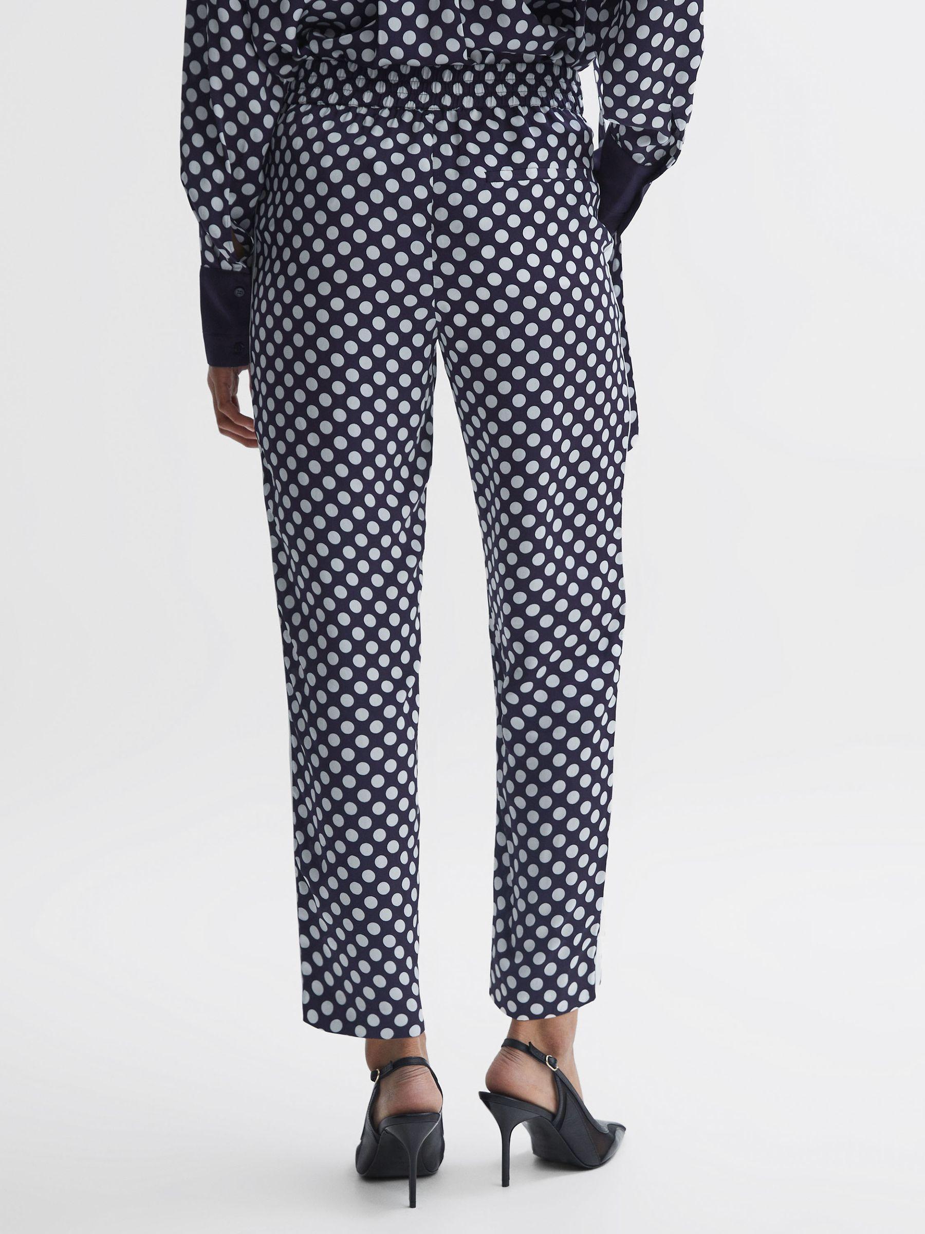 Polka Dot Drawstring Tapered Trousers in Navy/White Product Image