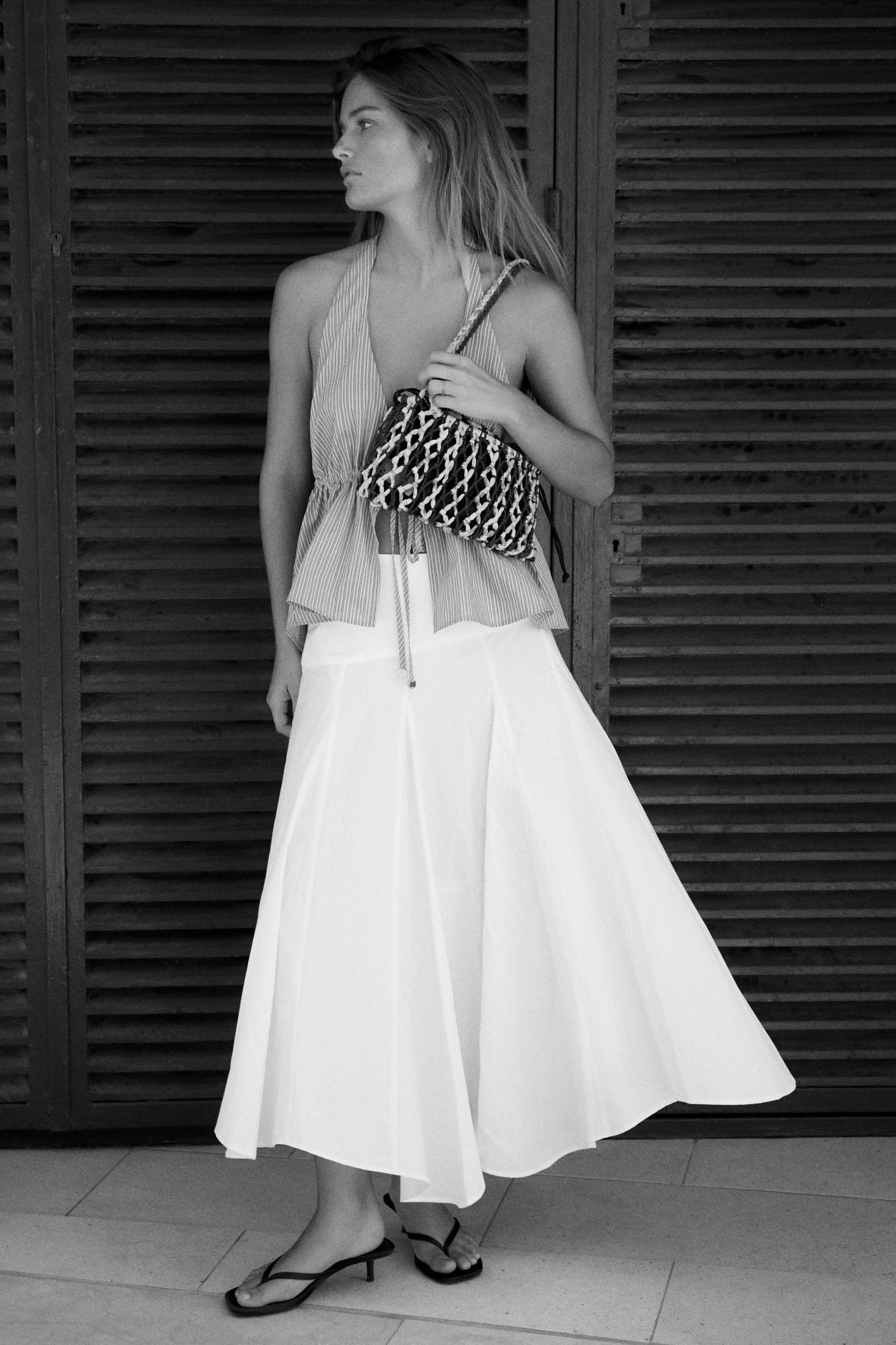 ASYMMETRIC MIDI SKIRT Product Image